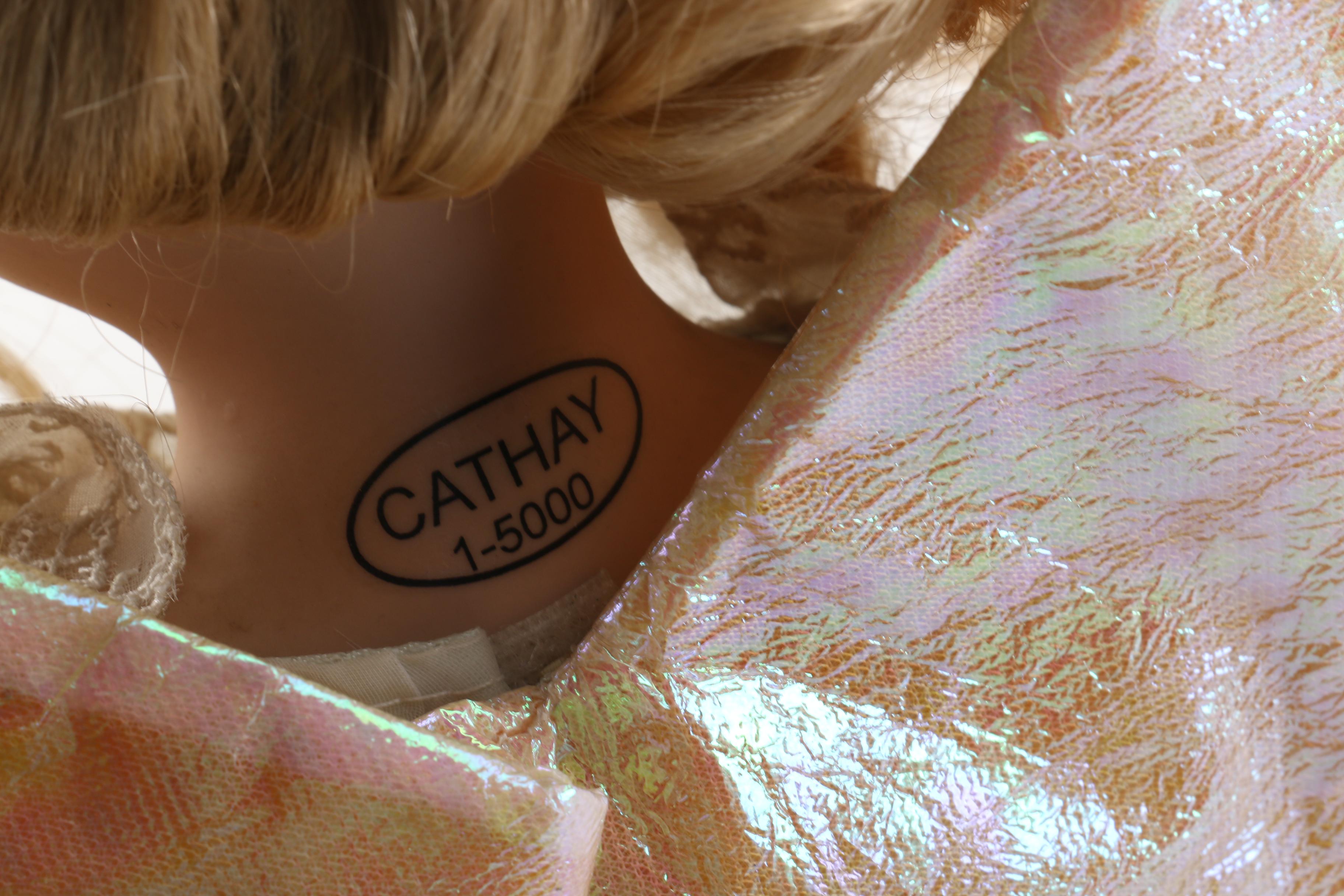 Vintage Porcelain and Vinyl Dolls Featuring Cathay Collection and DanDee