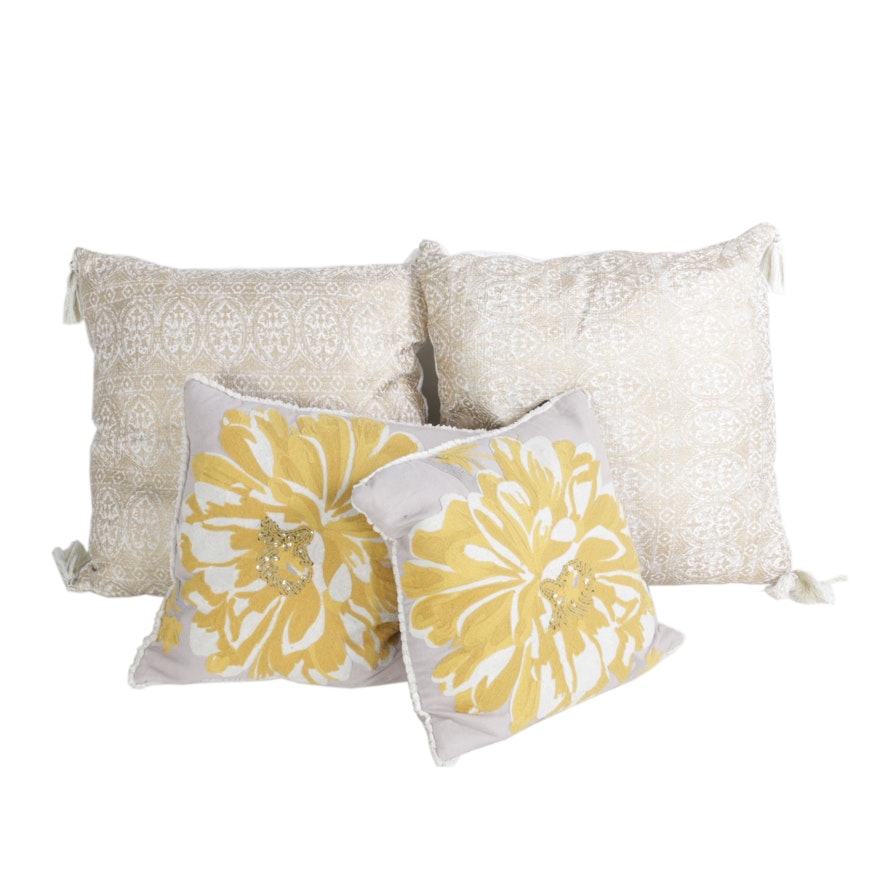 Pairs of Decorative Pillows with Floral Motifs and Tassel Accents