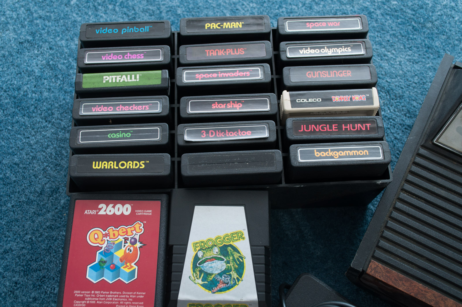 Vintage Atari Game Console with Paddles and Games