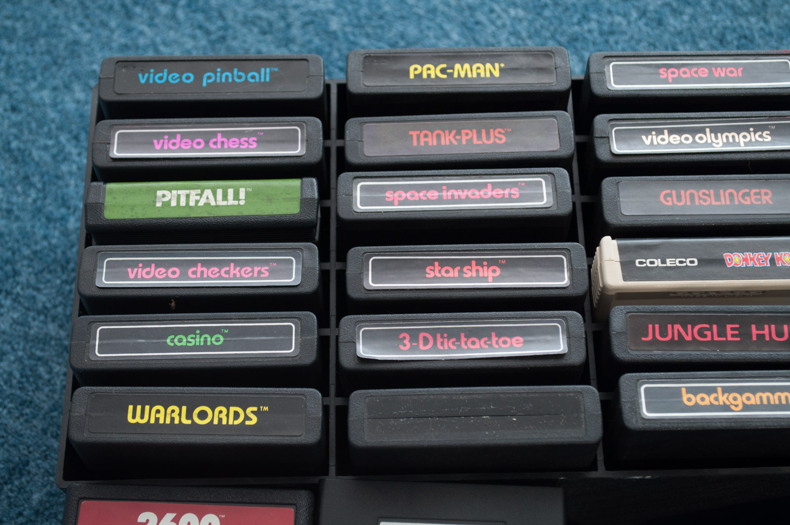 Vintage Atari Game Console with Paddles and Games