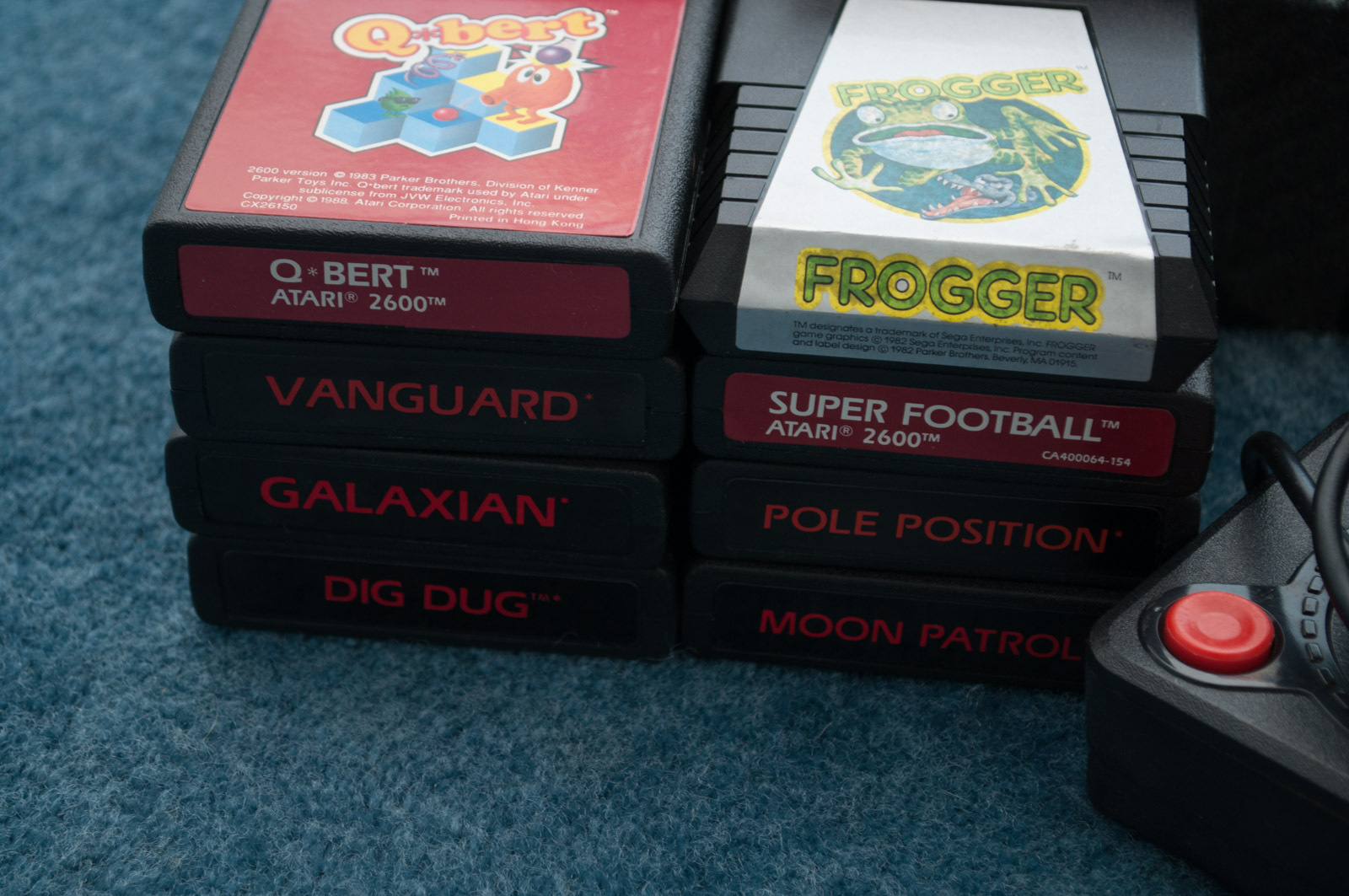 Vintage Atari Game Console with Paddles and Games