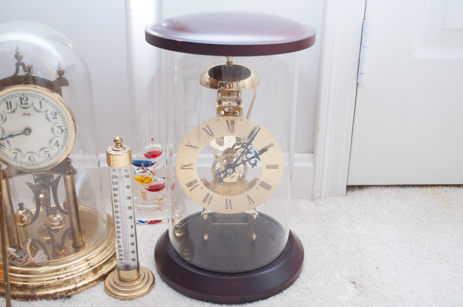 Skeleton Clocks and Barometers with Crystal Prism and Radiometer