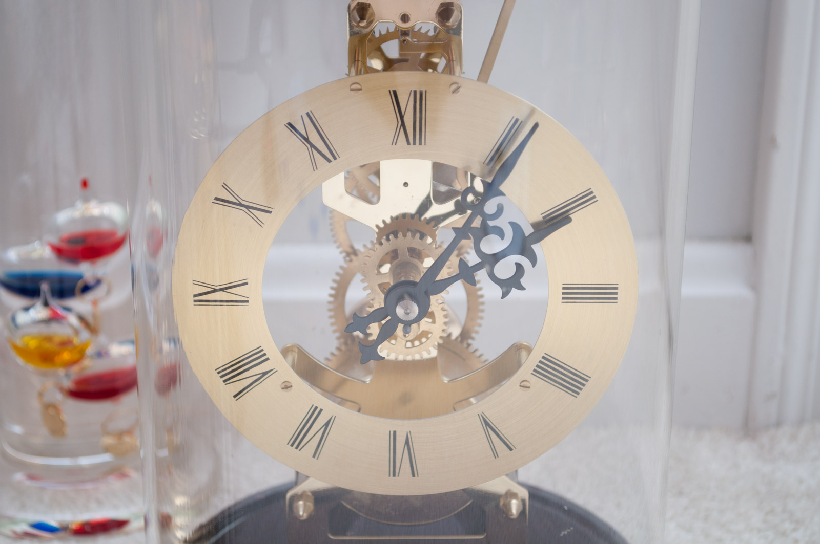 Skeleton Clocks and Barometers with Crystal Prism and Radiometer