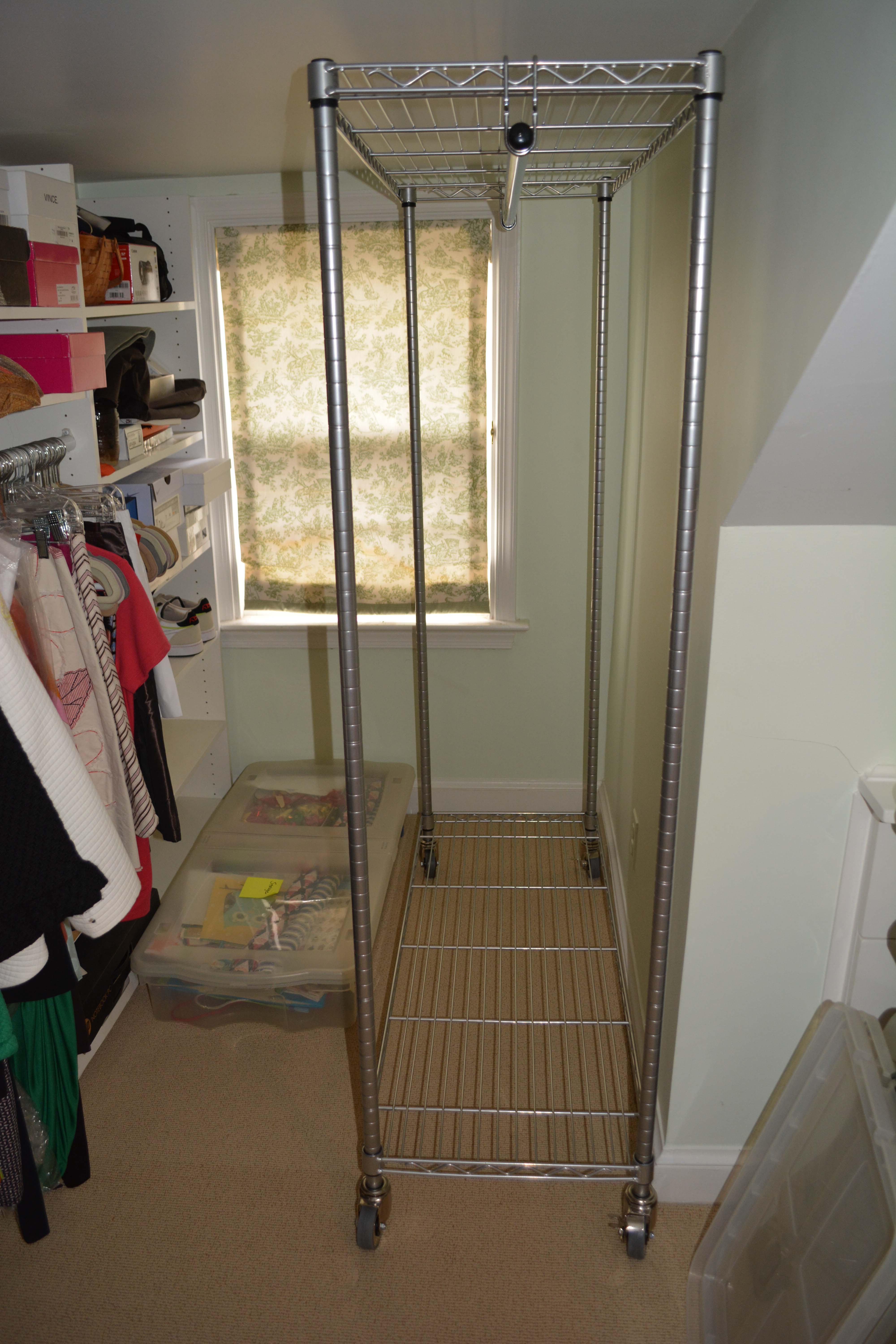 Pair of InterMETRO Rolling Clothing Racks