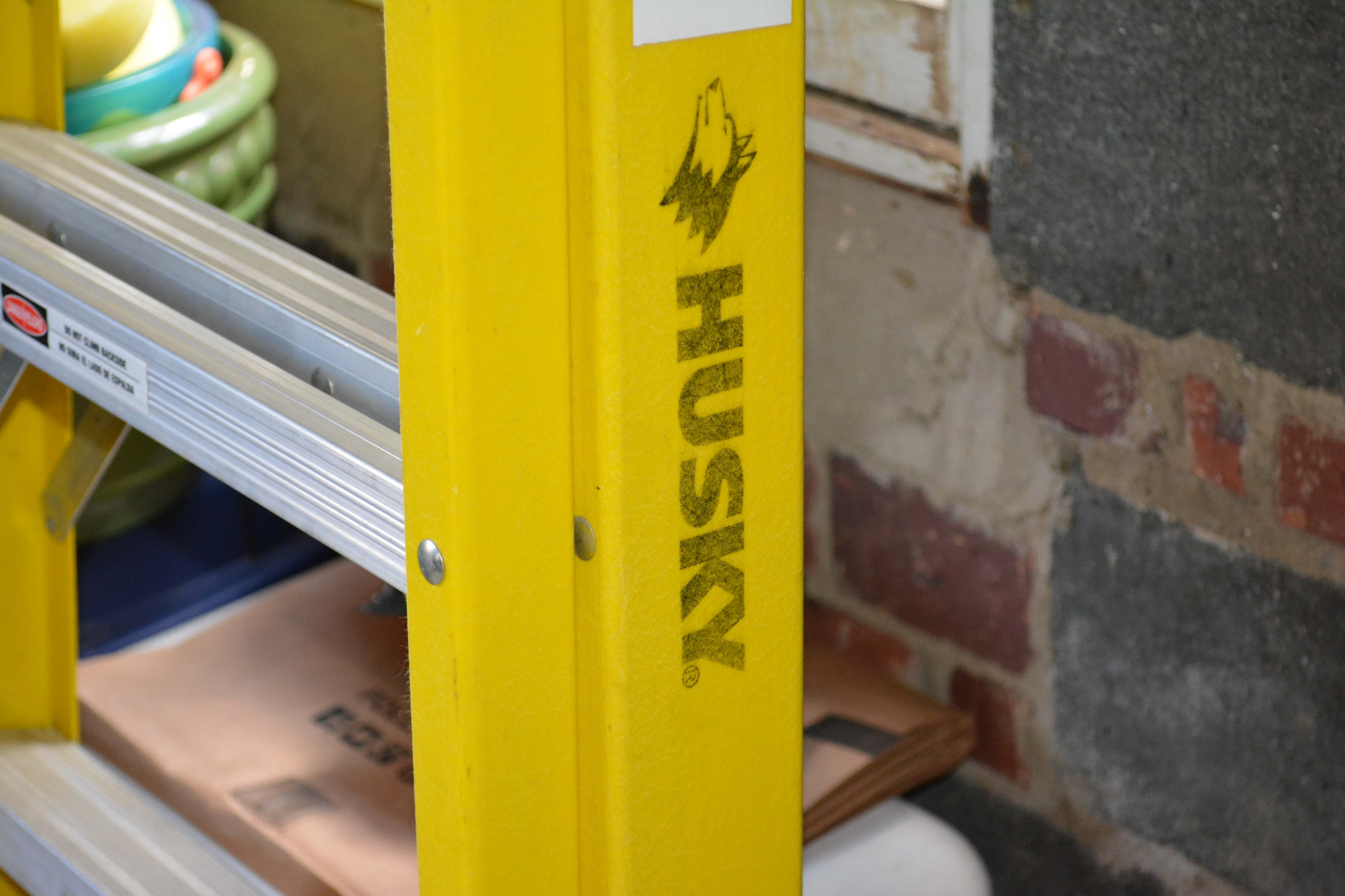 Husky Brand Yellow and Silver Tone Ladder