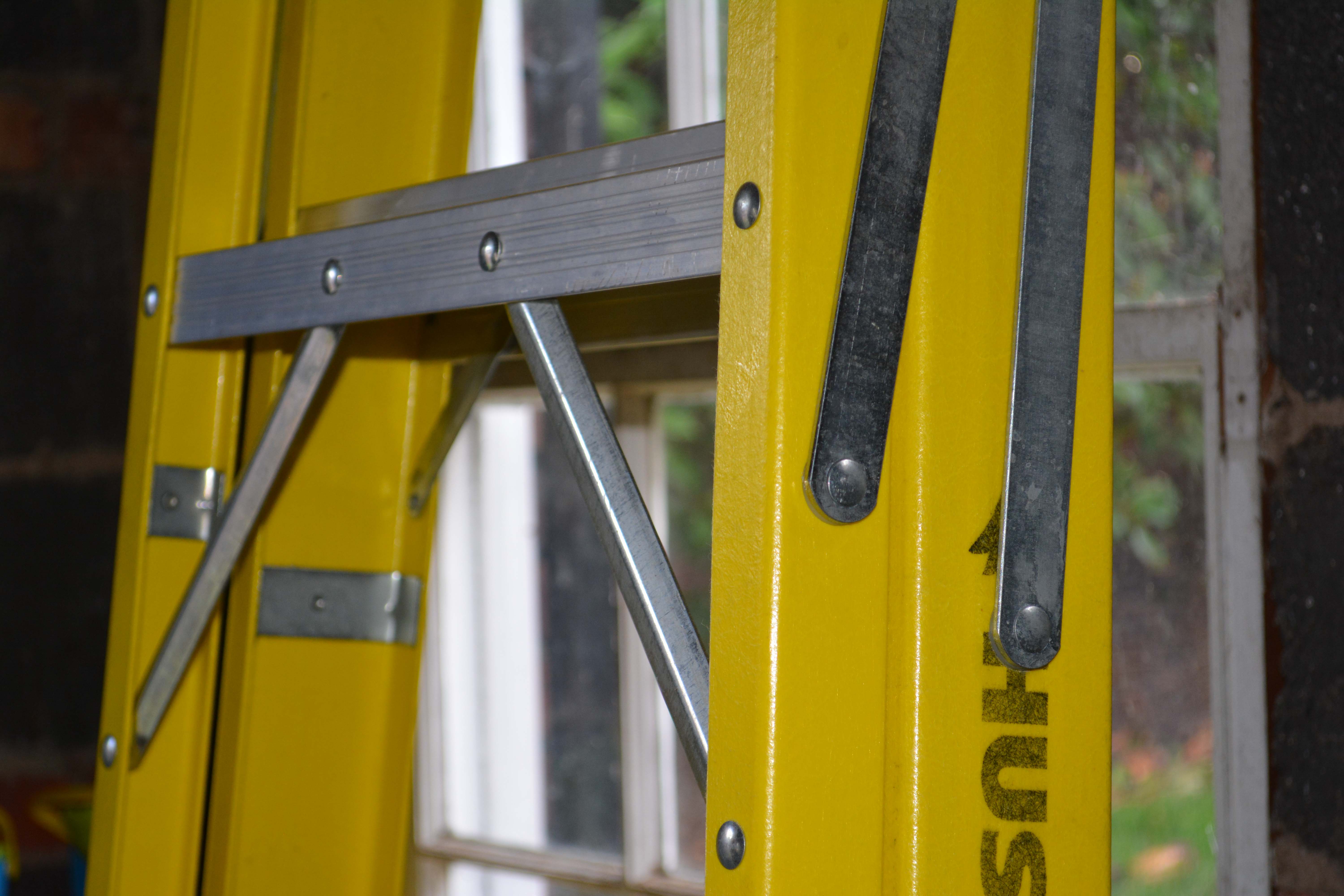 Husky Brand Yellow and Silver Tone Ladder