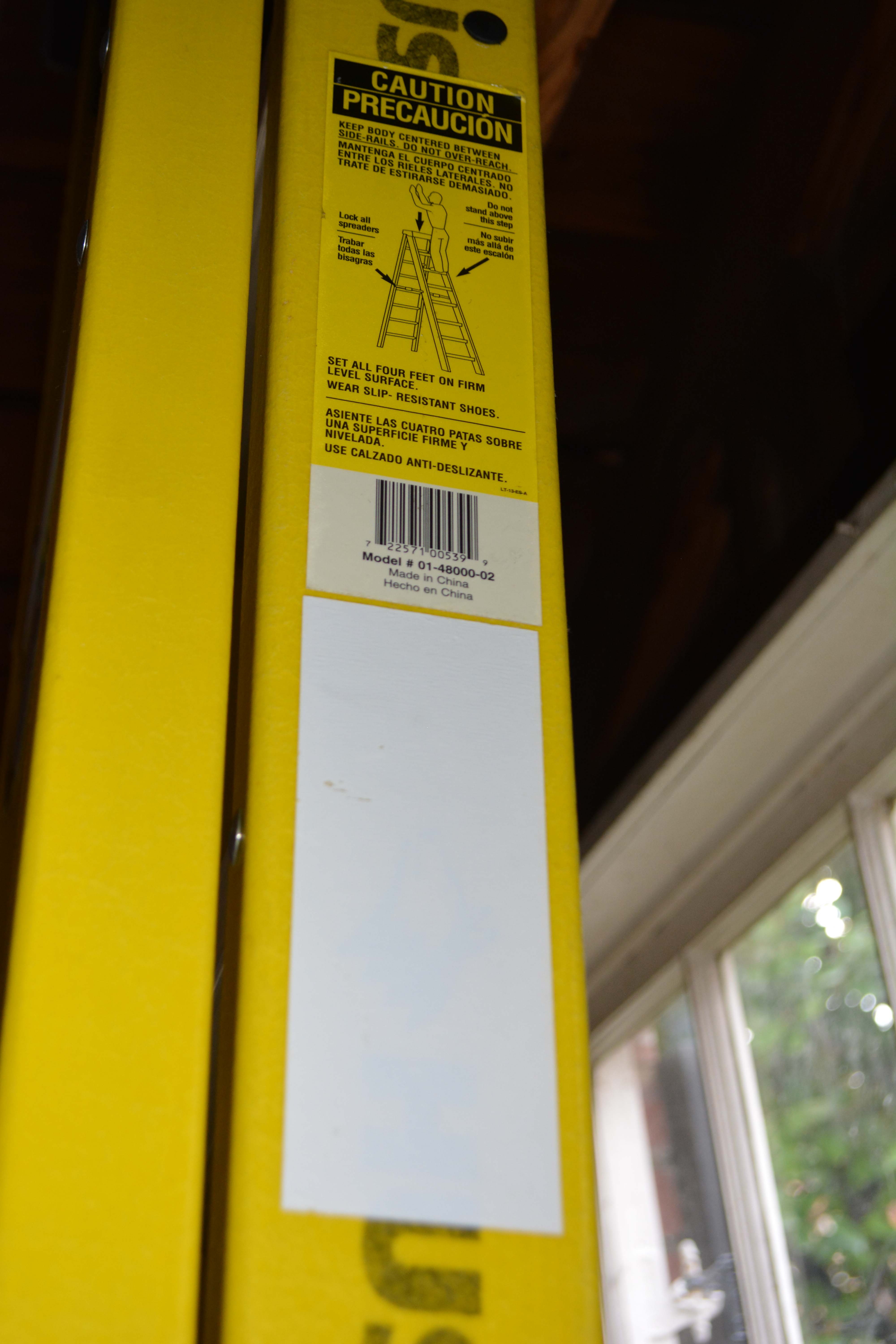 Husky Brand Yellow and Silver Tone Ladder