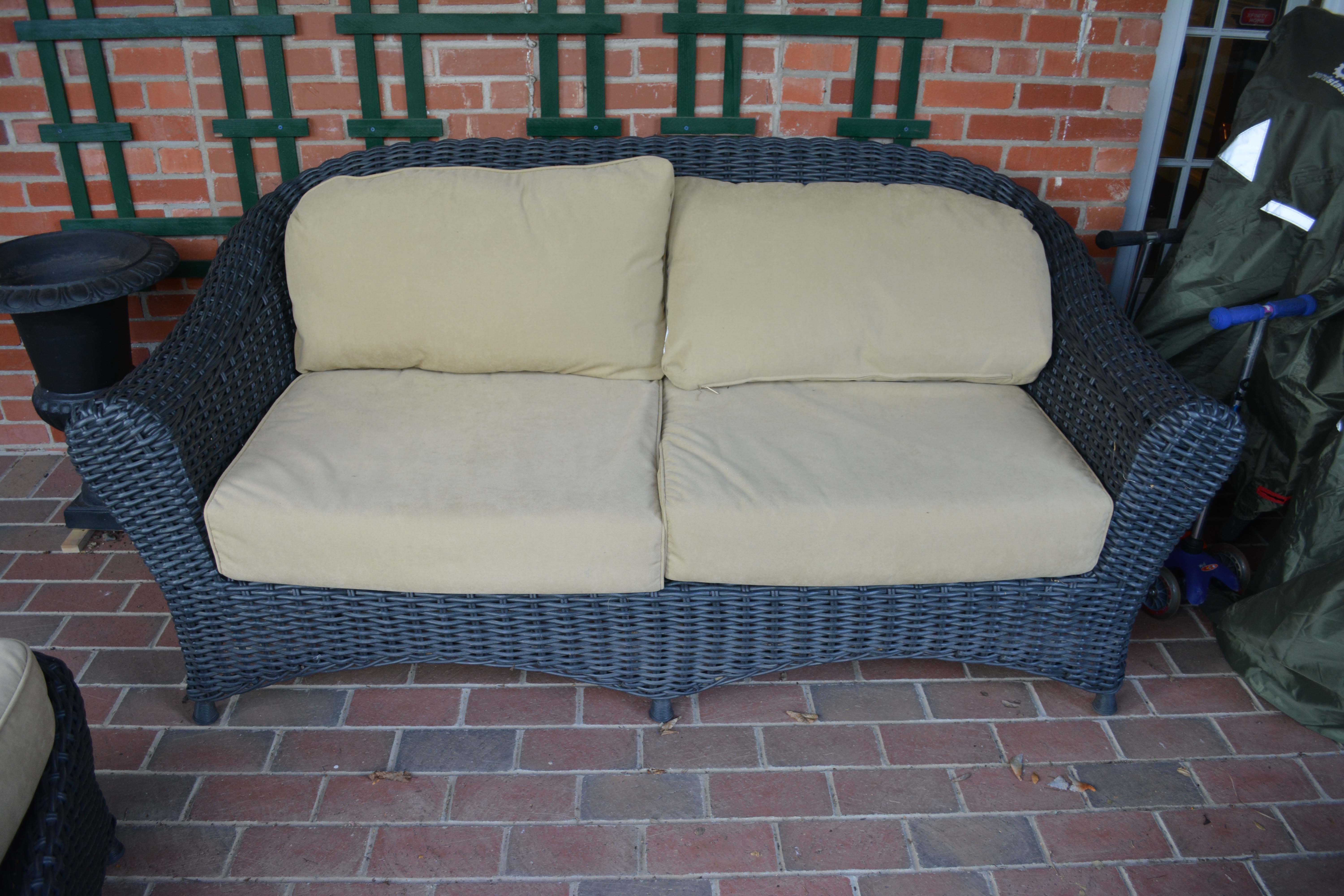 Black Plastic Wicker Sofa and Two Ottomans