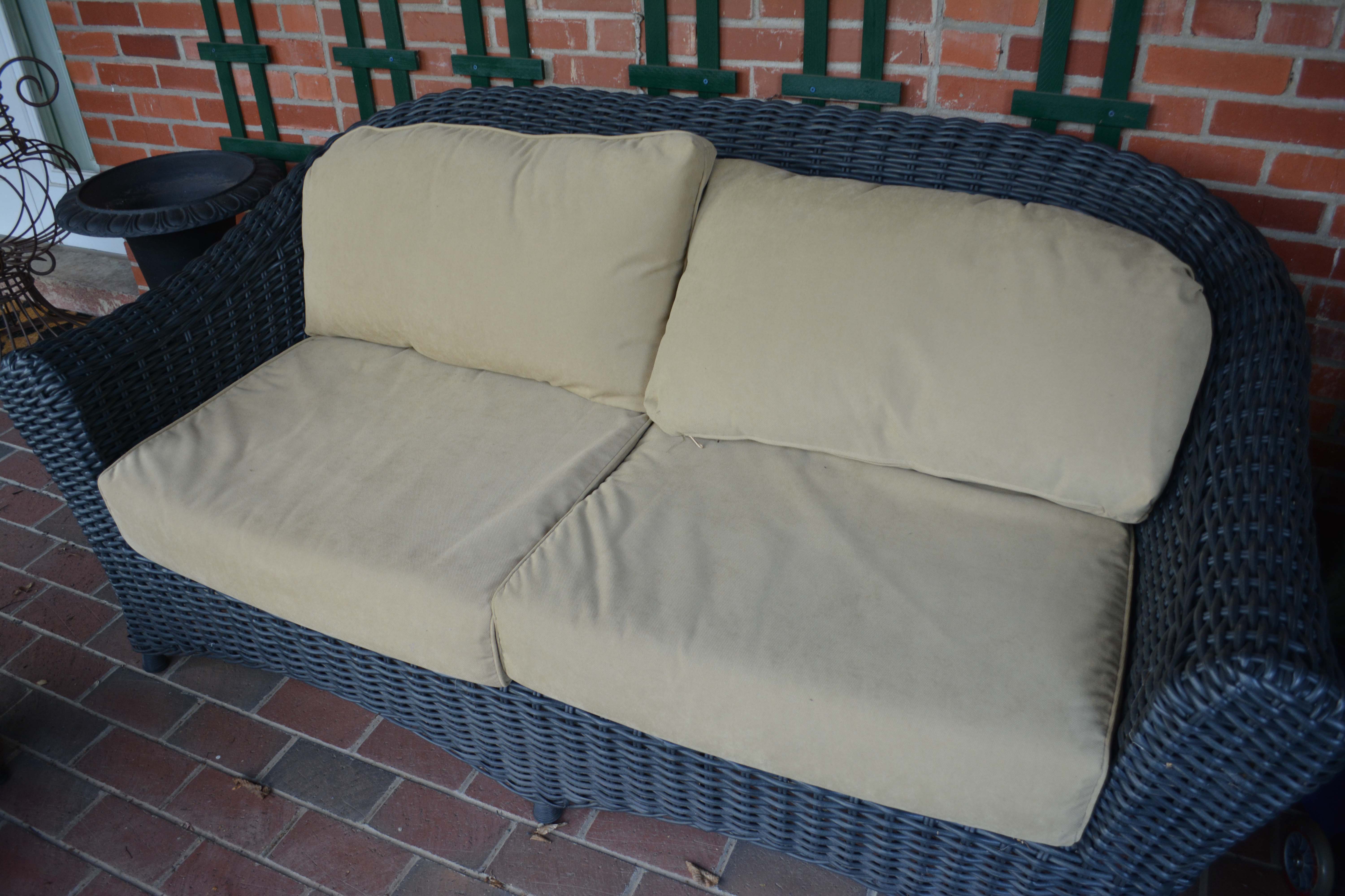 Black Plastic Wicker Sofa and Two Ottomans