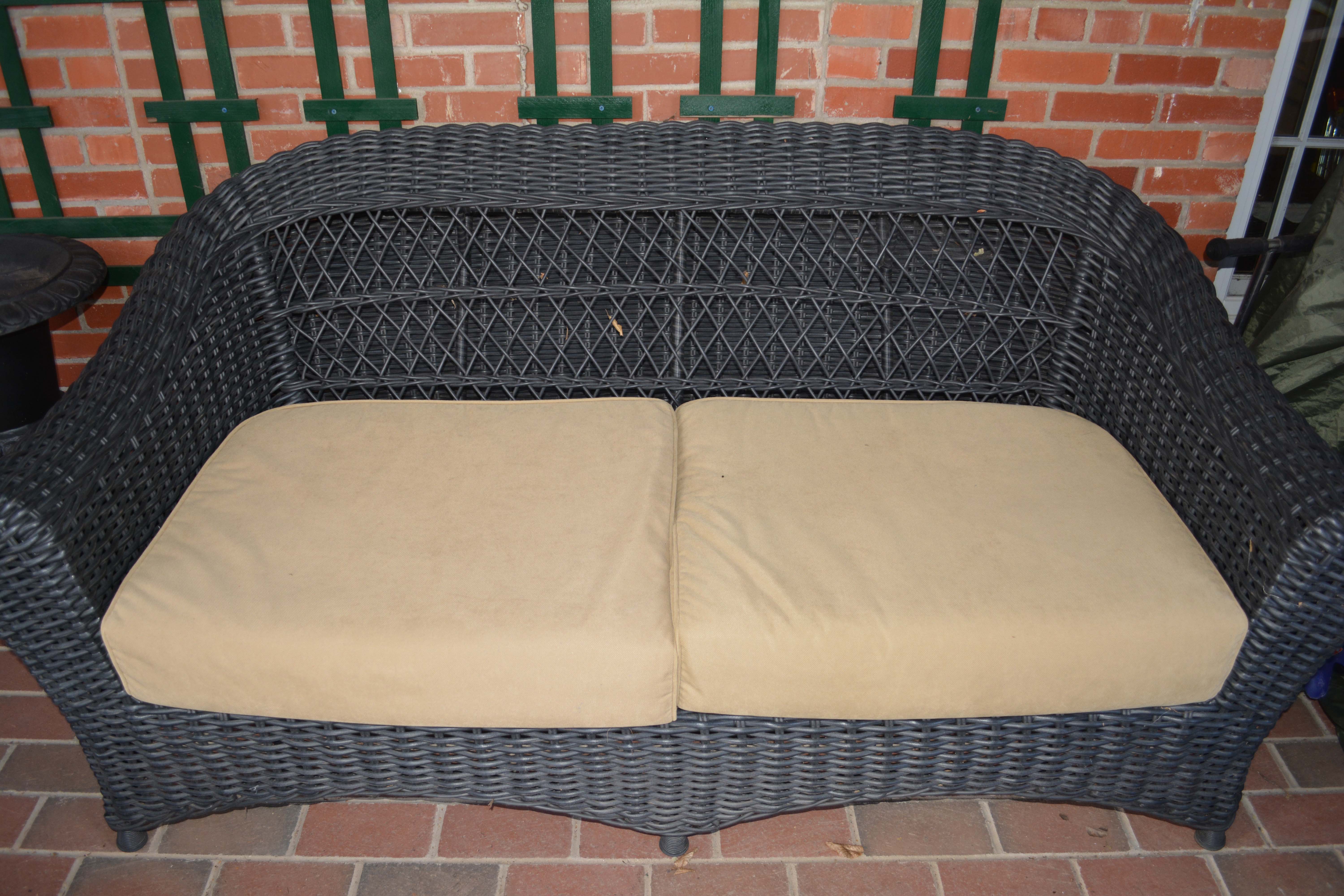 Black Plastic Wicker Sofa and Two Ottomans