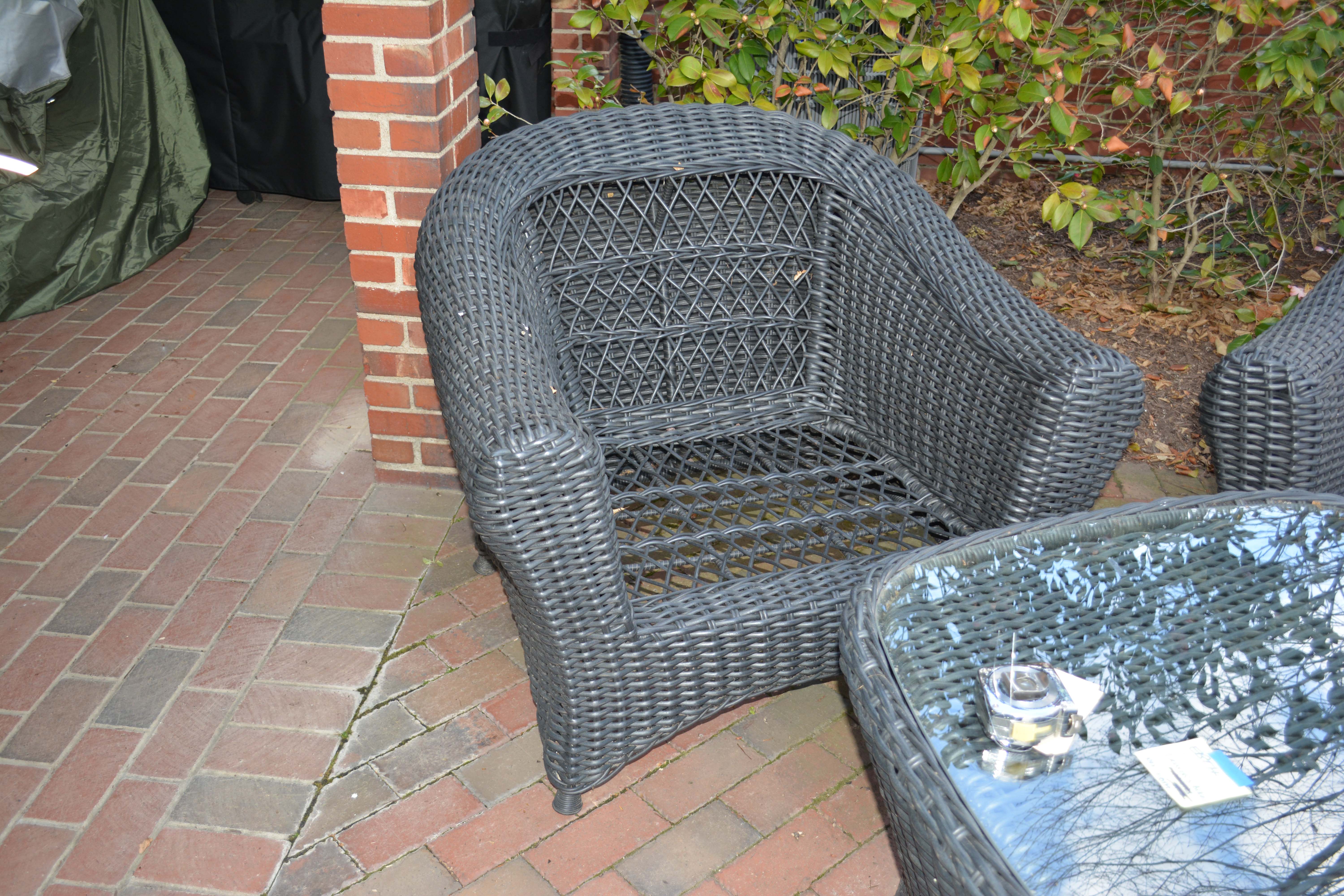 Black Plastic Wicker Armchairs and Glass Top Table