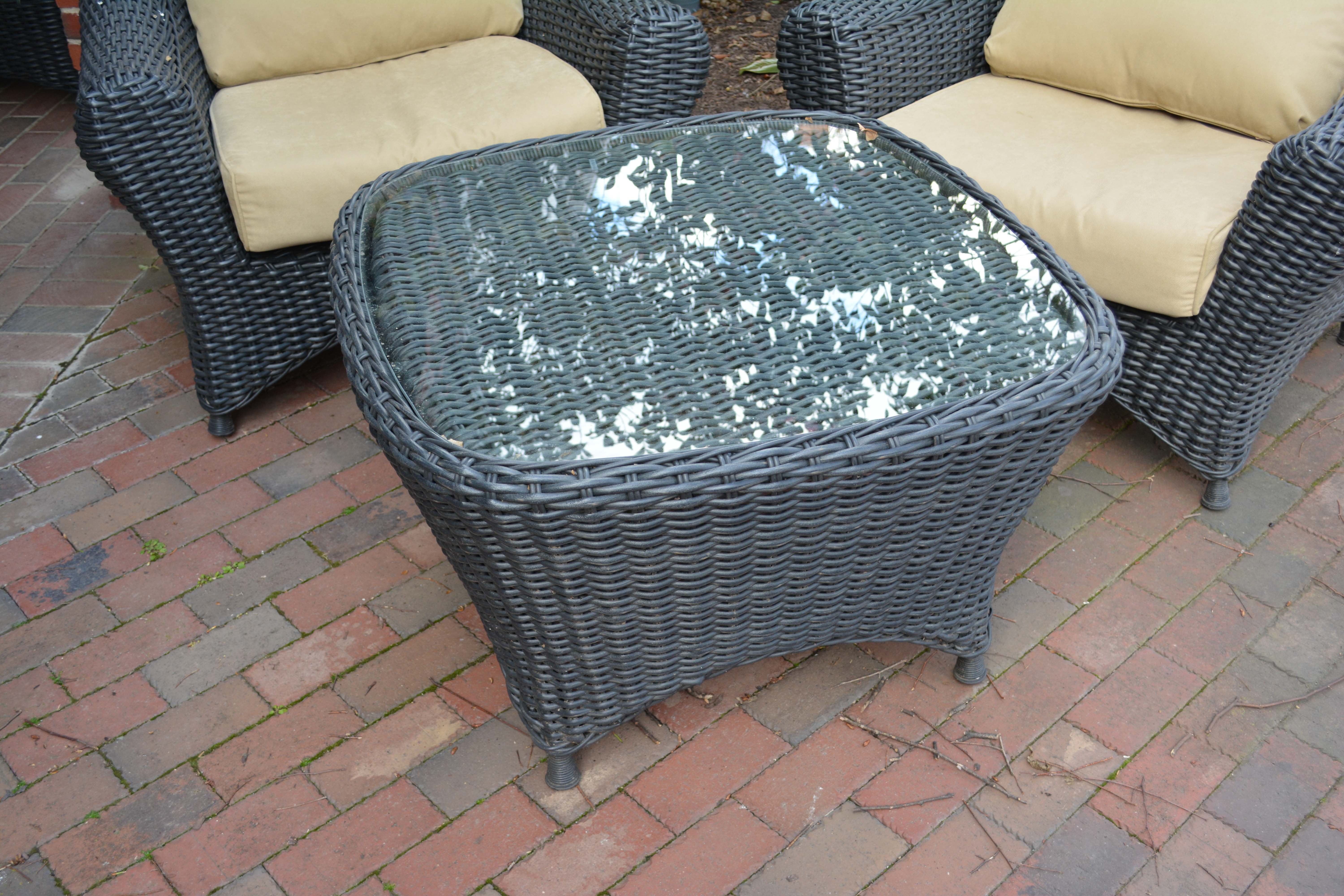 Black Plastic Wicker Armchairs and Glass Top Table