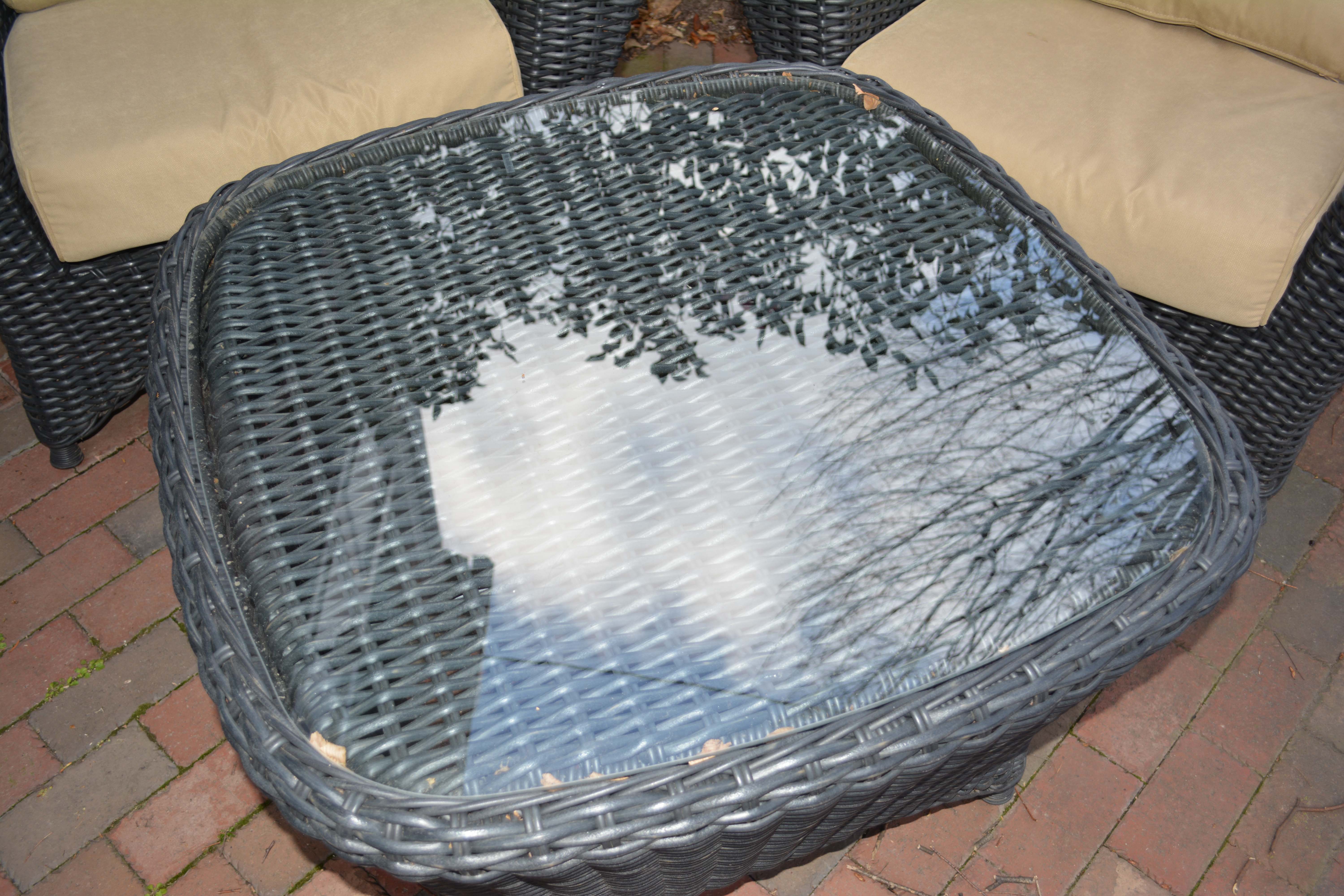 Black Plastic Wicker Armchairs and Glass Top Table
