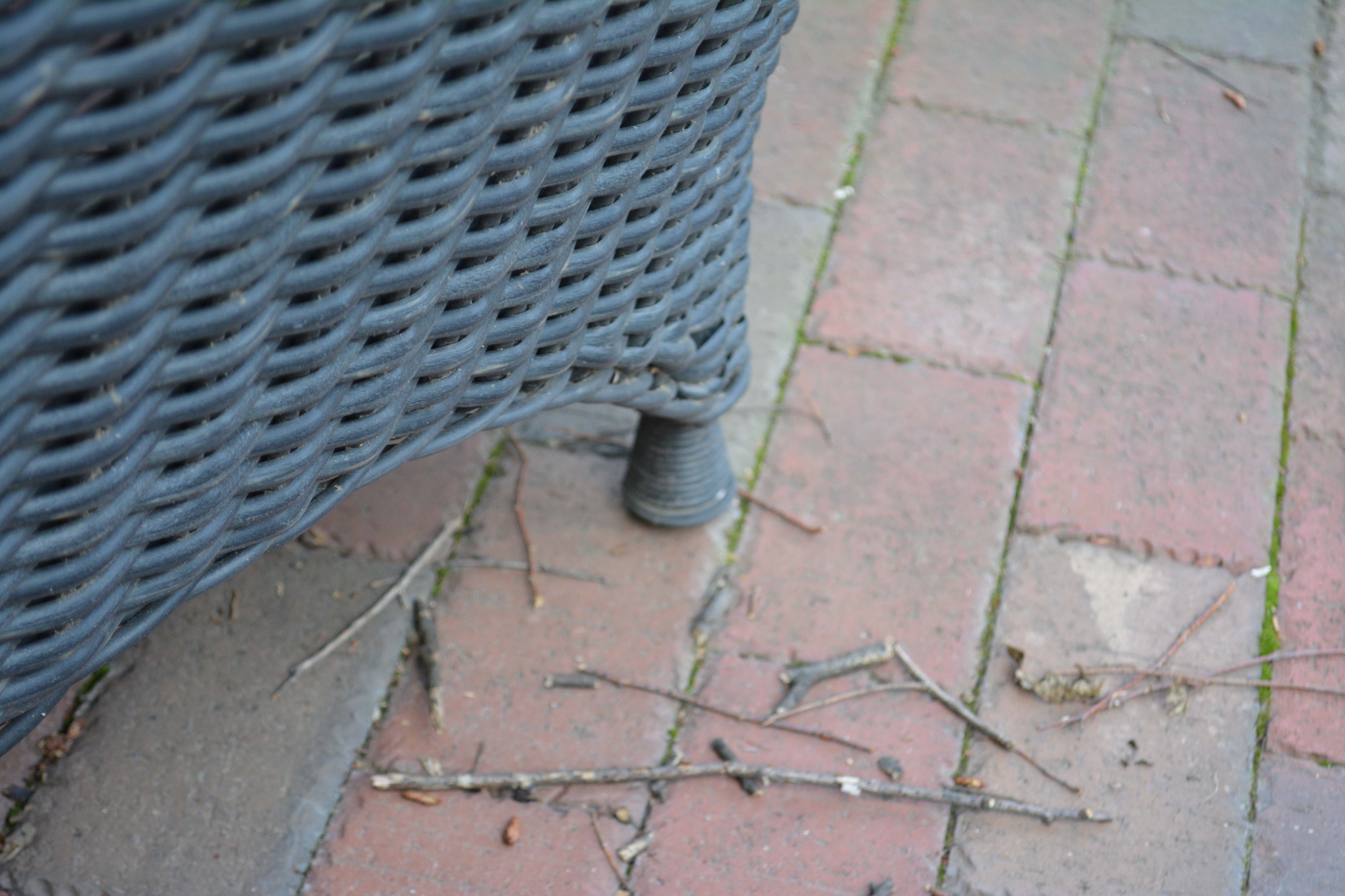 Black Plastic Wicker Armchairs and Glass Top Table