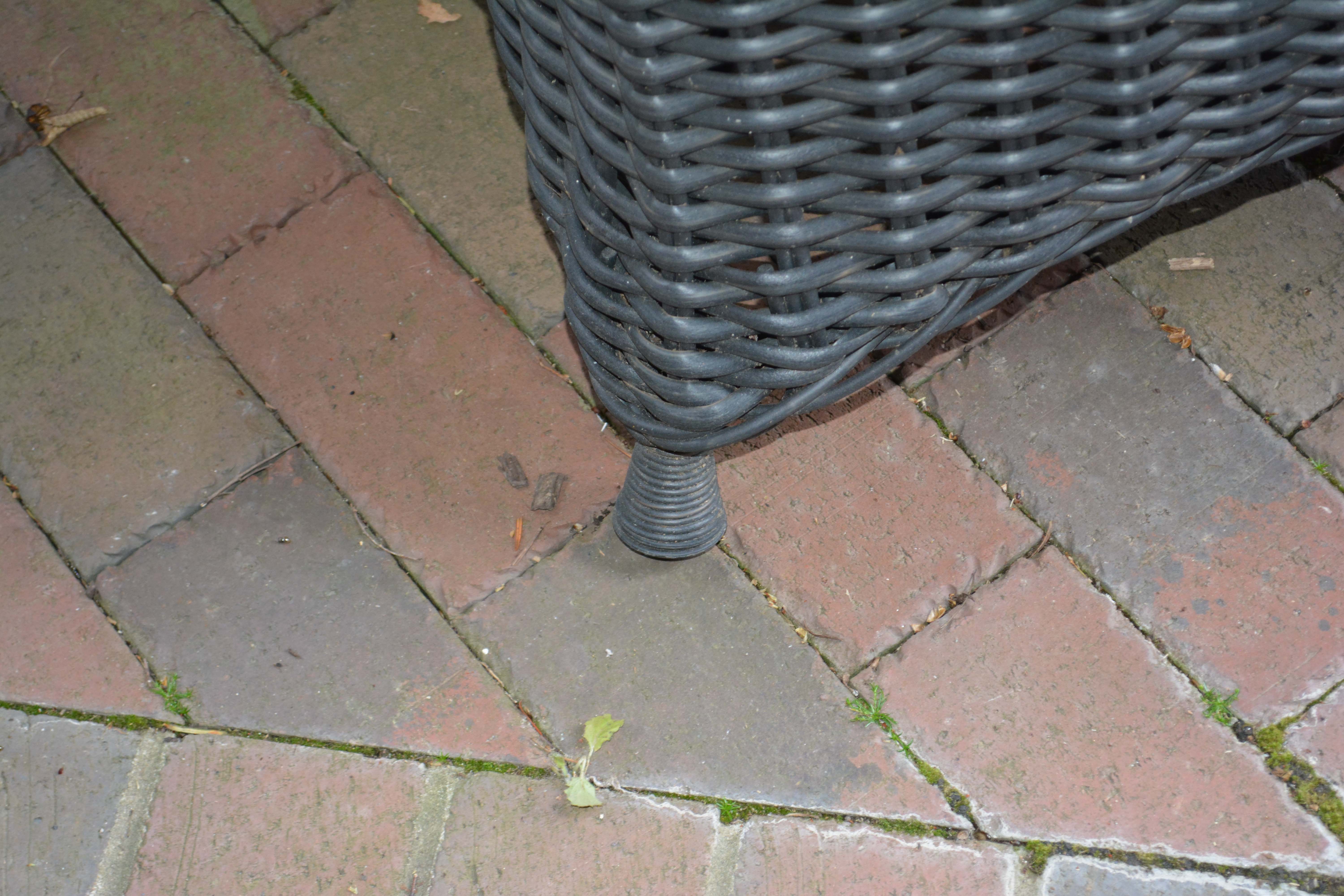 Black Plastic Wicker Armchairs and Glass Top Table