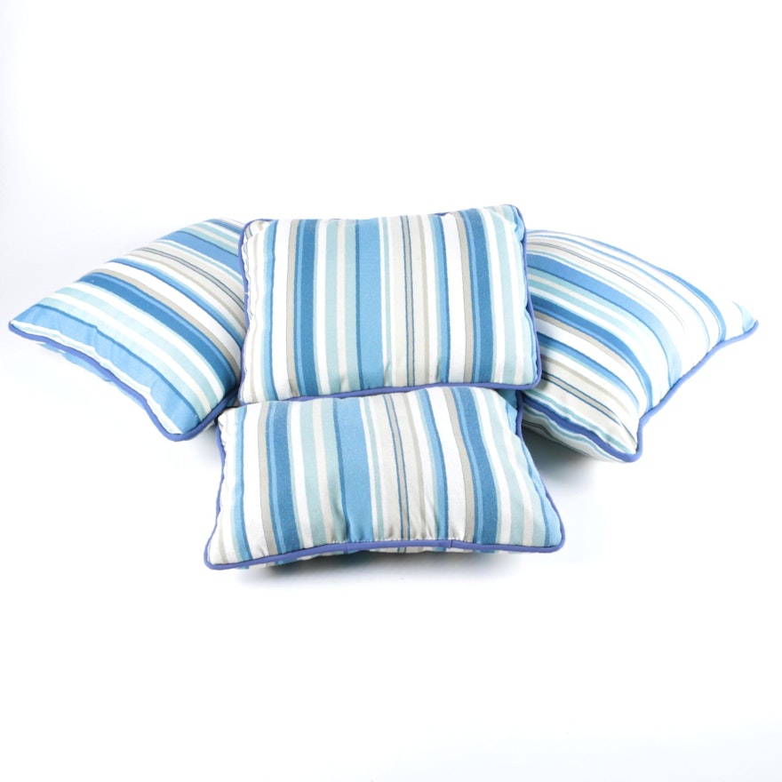 Four Blue and White Striped Accent Pillows