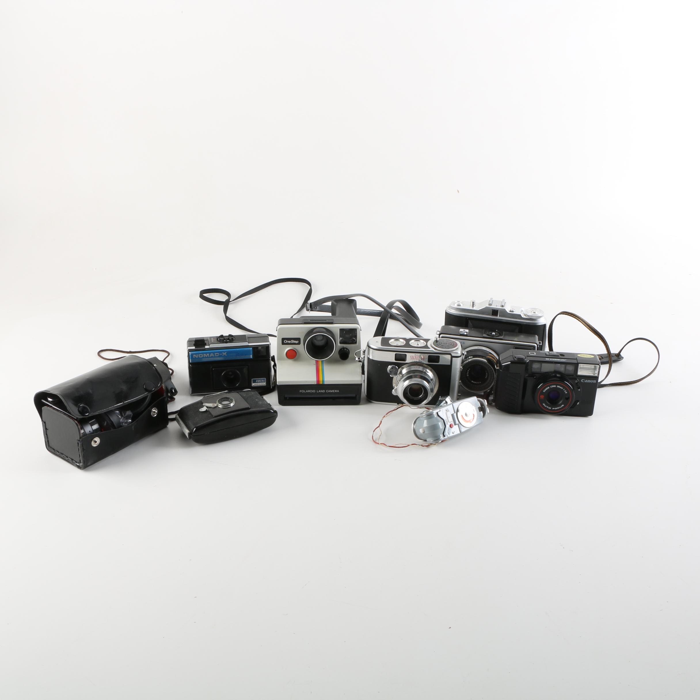 Vintage Cameras Featuring Kodak, Canon and Polaroid