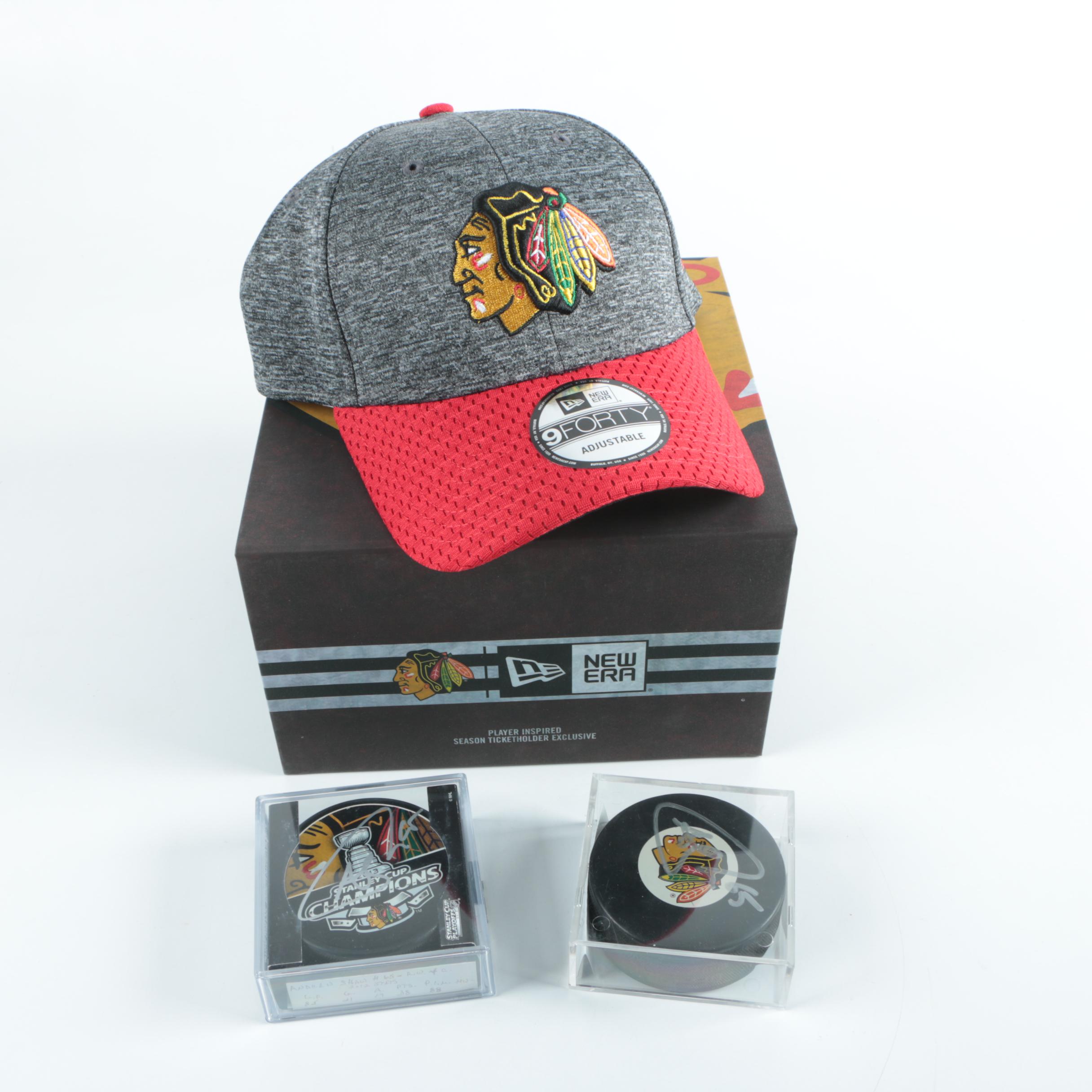 Autographed Andrew Shaw Chicago Blackhawks Pucks with Blackhawks Hat
