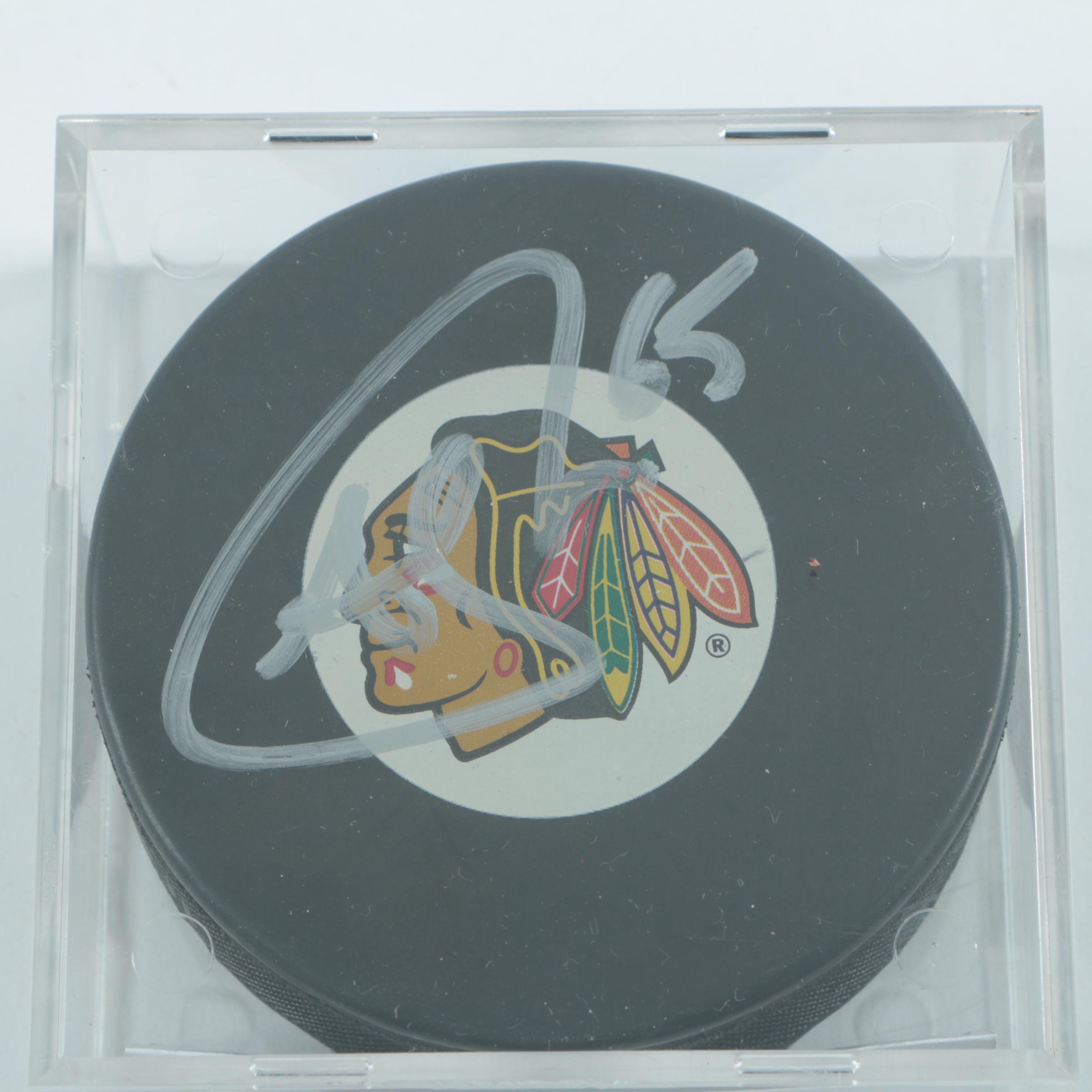 Autographed Andrew Shaw Chicago Blackhawks Pucks with Blackhawks Hat