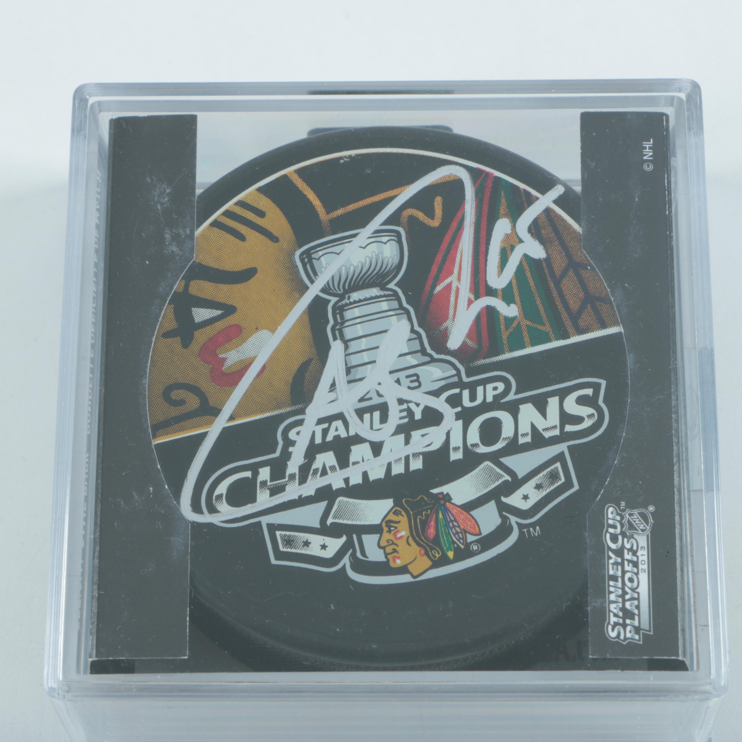 Autographed Andrew Shaw Chicago Blackhawks Pucks with Blackhawks Hat