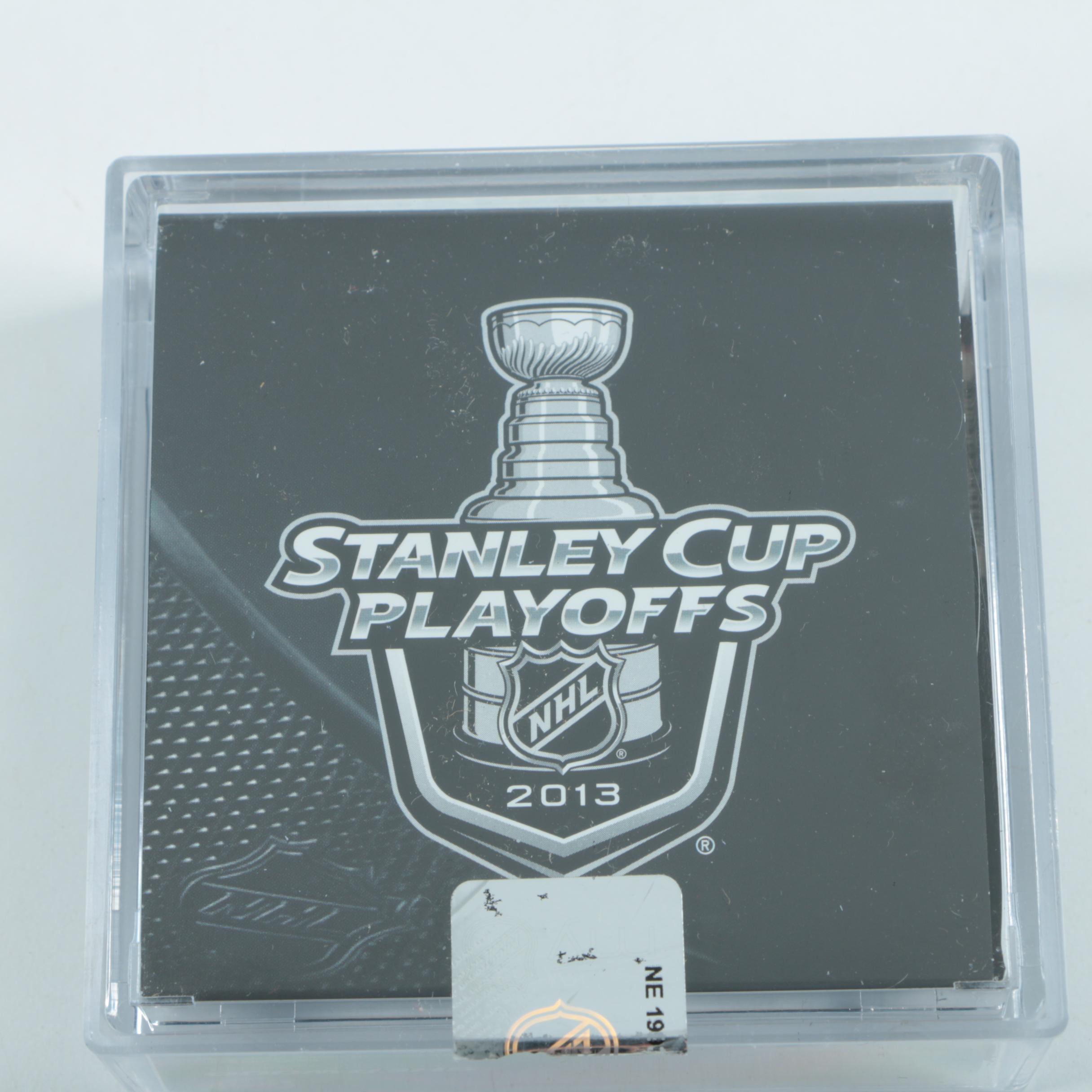 Autographed Andrew Shaw Chicago Blackhawks Pucks with Blackhawks Hat