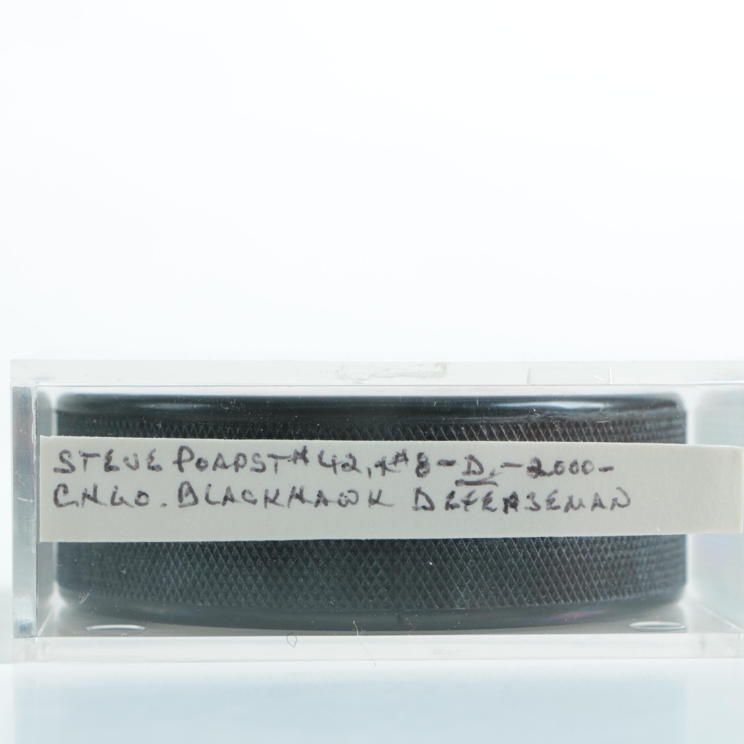 Autographed Chicago Blackhawks Hockey Pucks with 75th Anniversary Puck