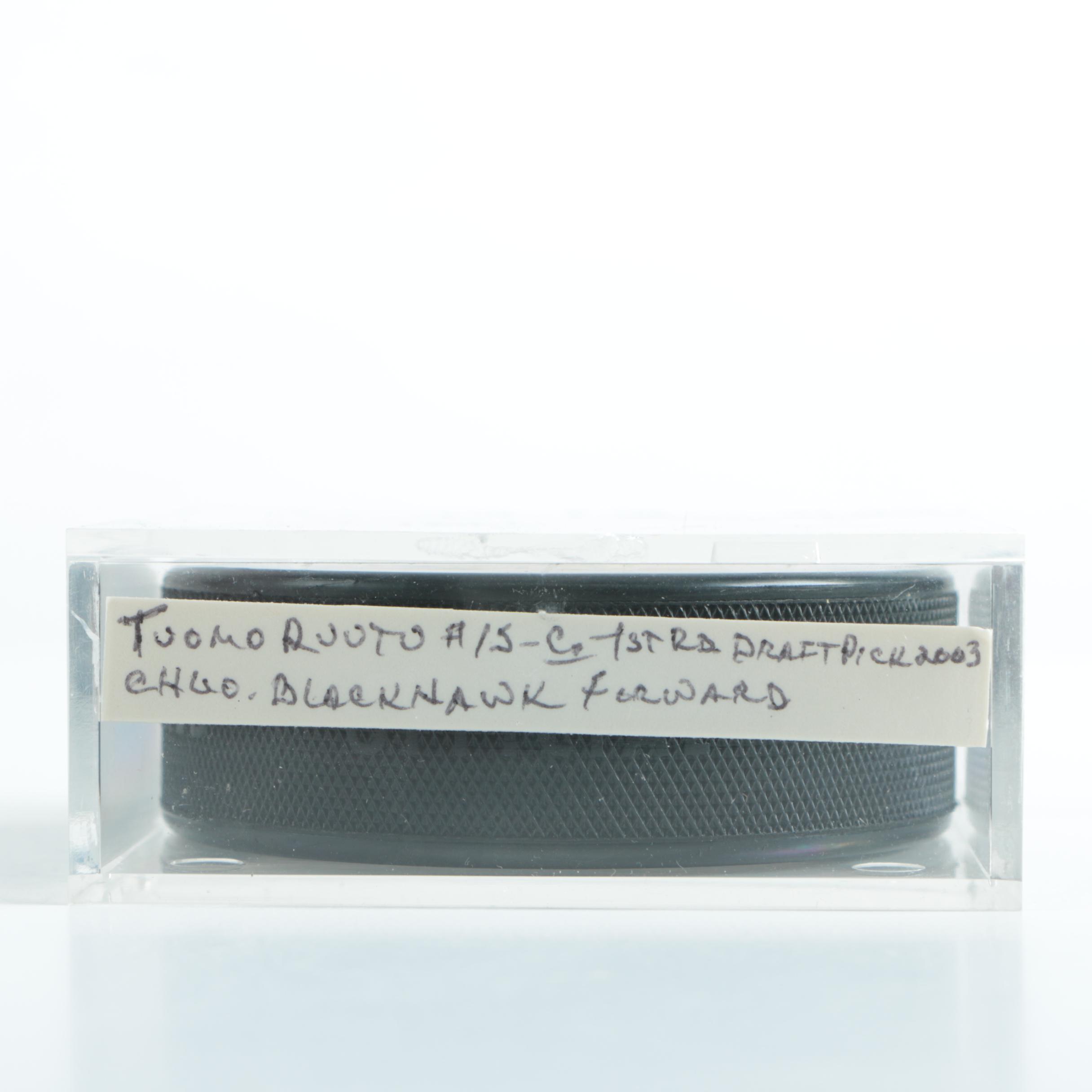 Autographed Chicago Blackhawks Hockey Pucks with 75th Anniversary Puck