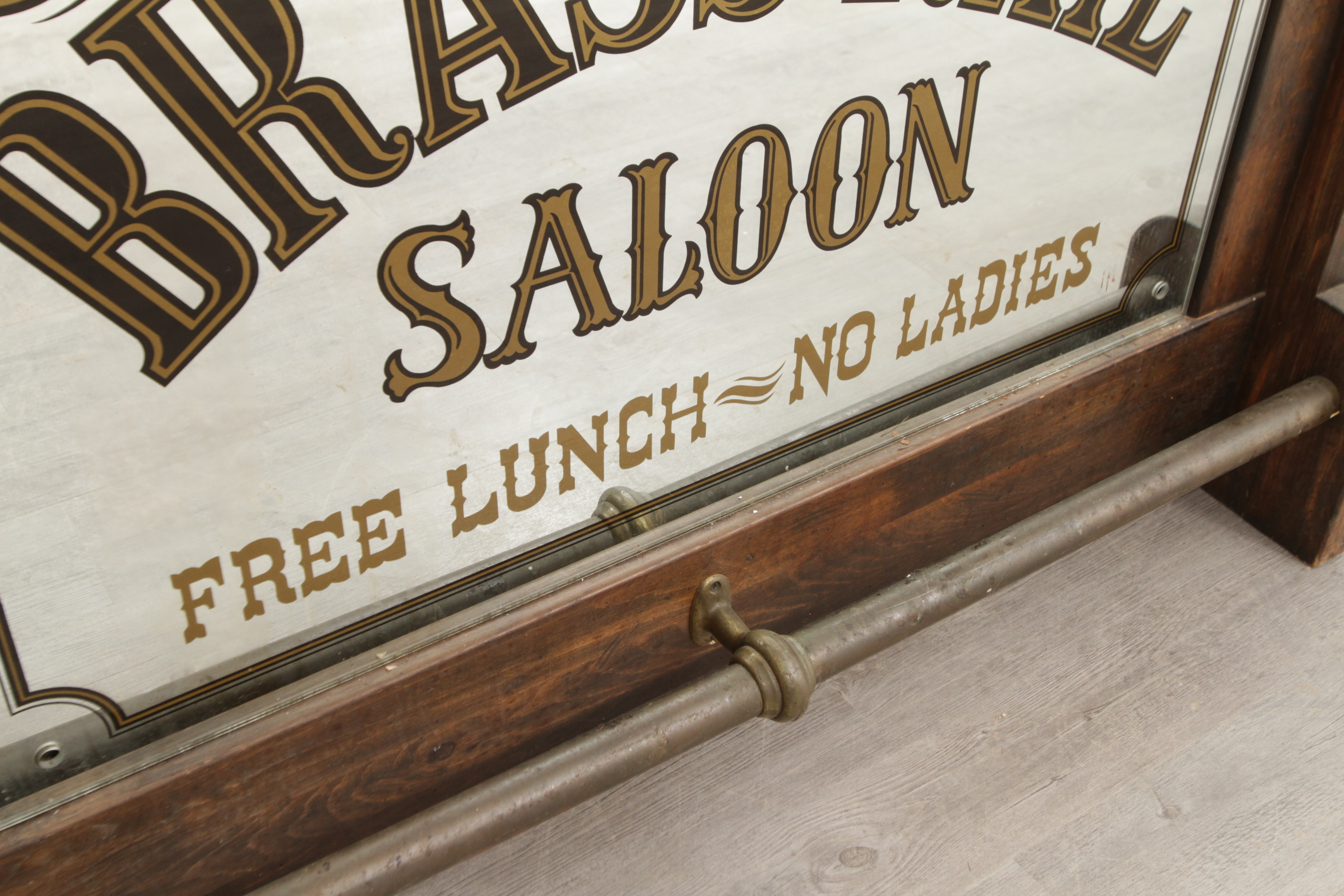 Antique-Style Wood Bar with Saloon Sign