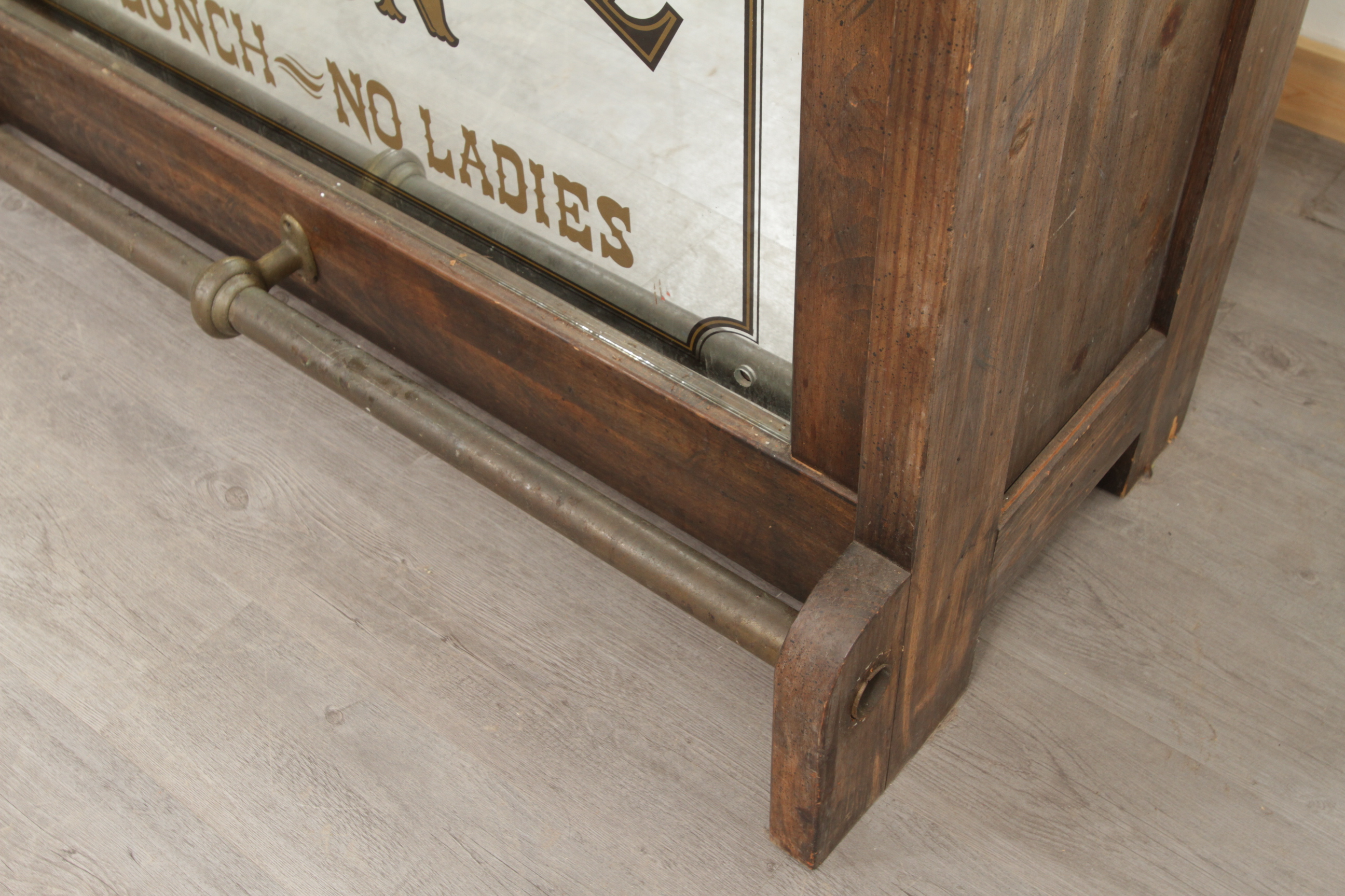 Antique-Style Wood Bar with Saloon Sign