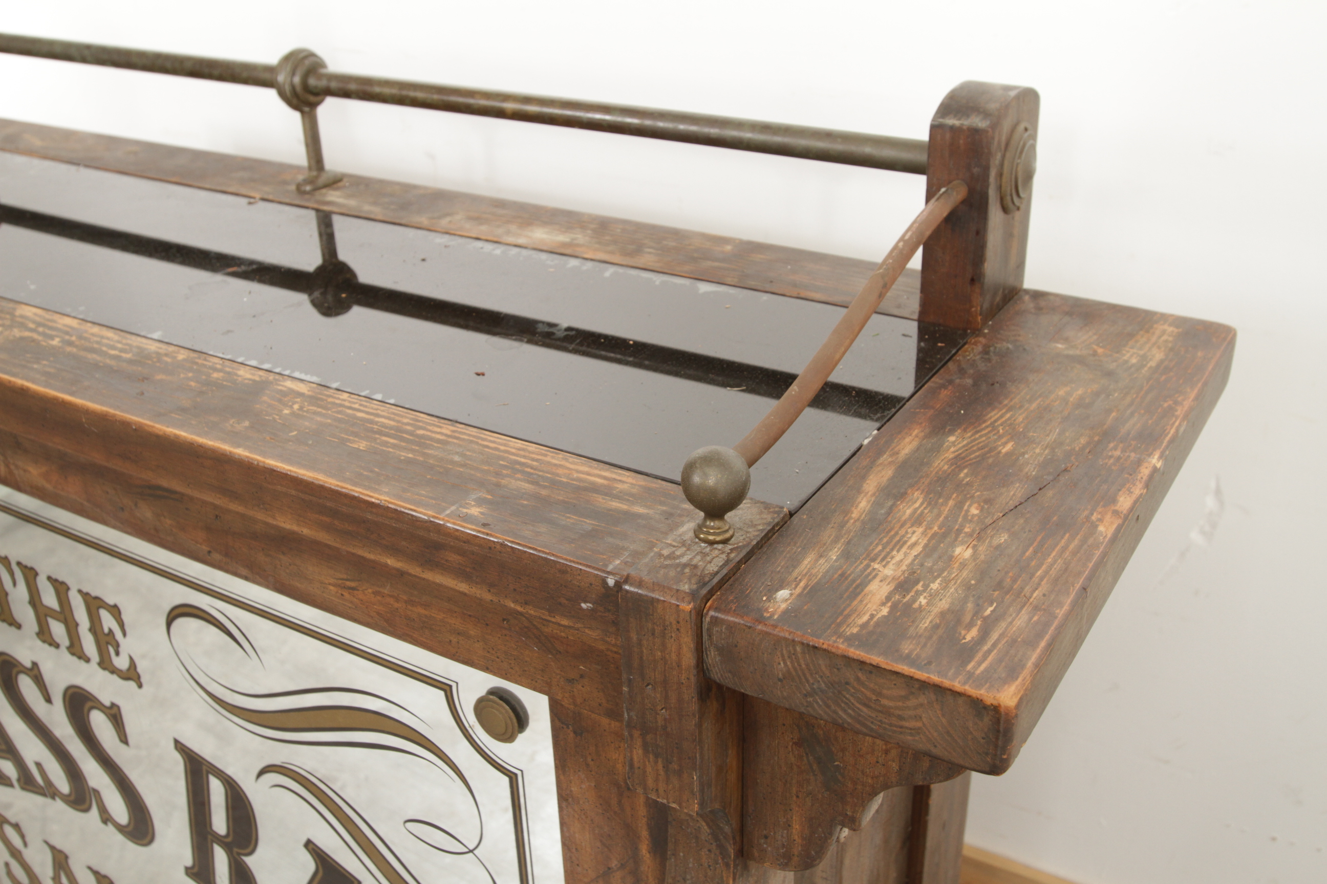 Antique-Style Wood Bar with Saloon Sign