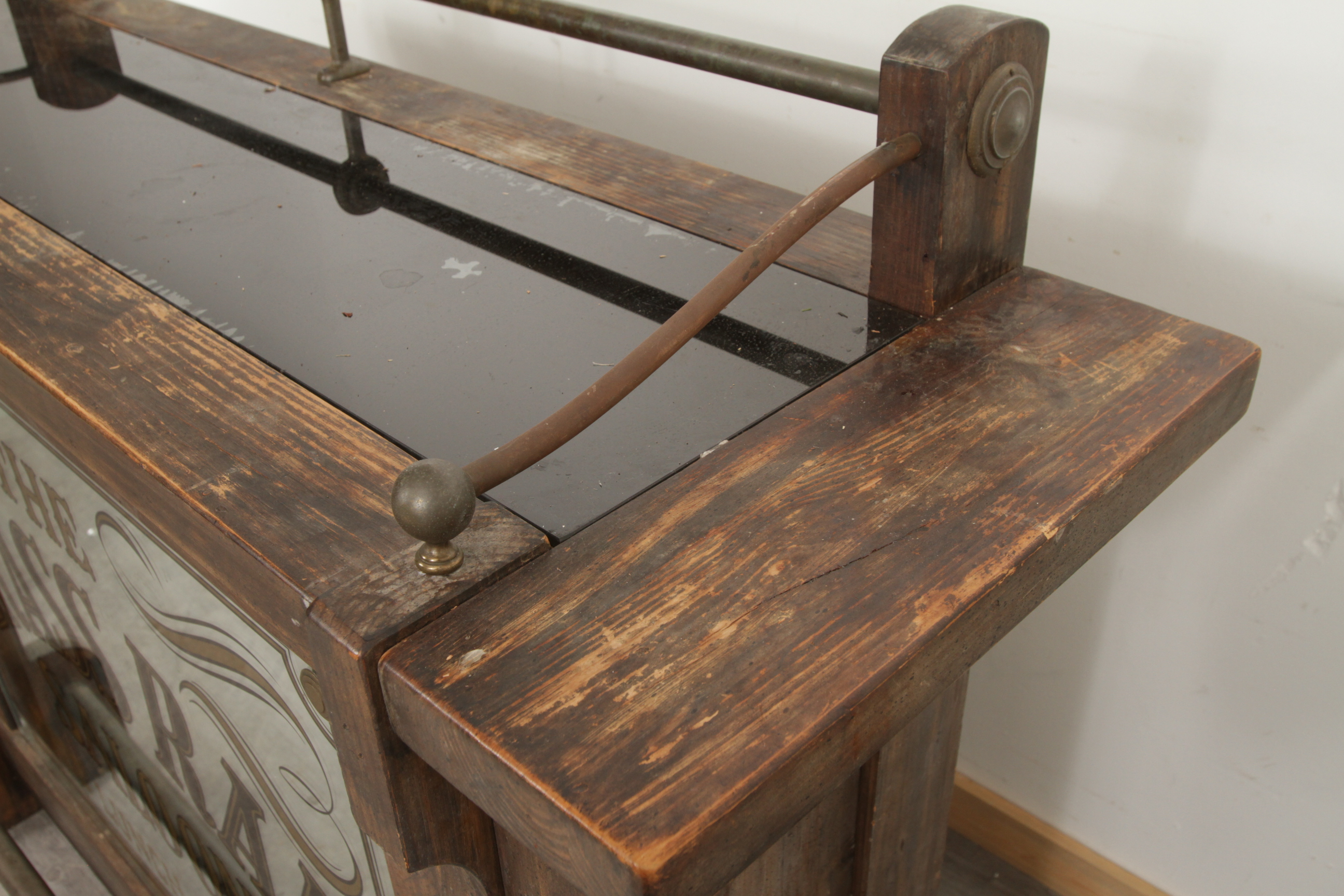 Antique-Style Wood Bar with Saloon Sign