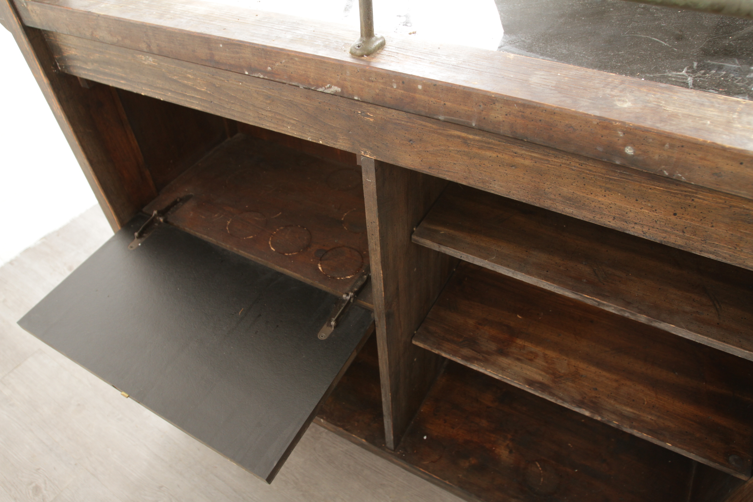 Antique-Style Wood Bar with Saloon Sign