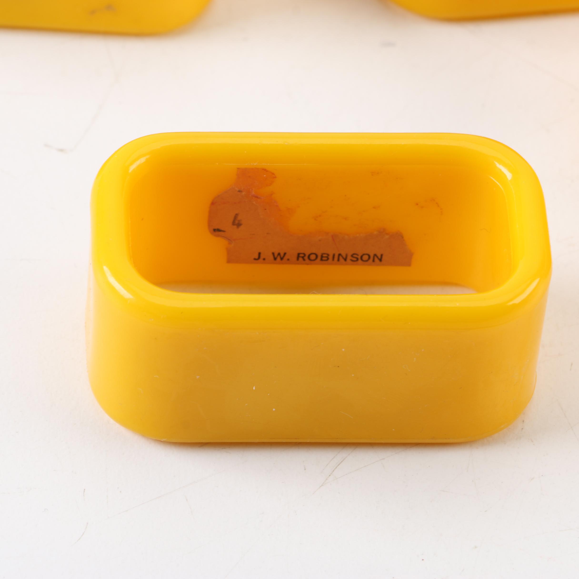 Vintage J. W. Robinson Yellow Plastic Napkin Rings
