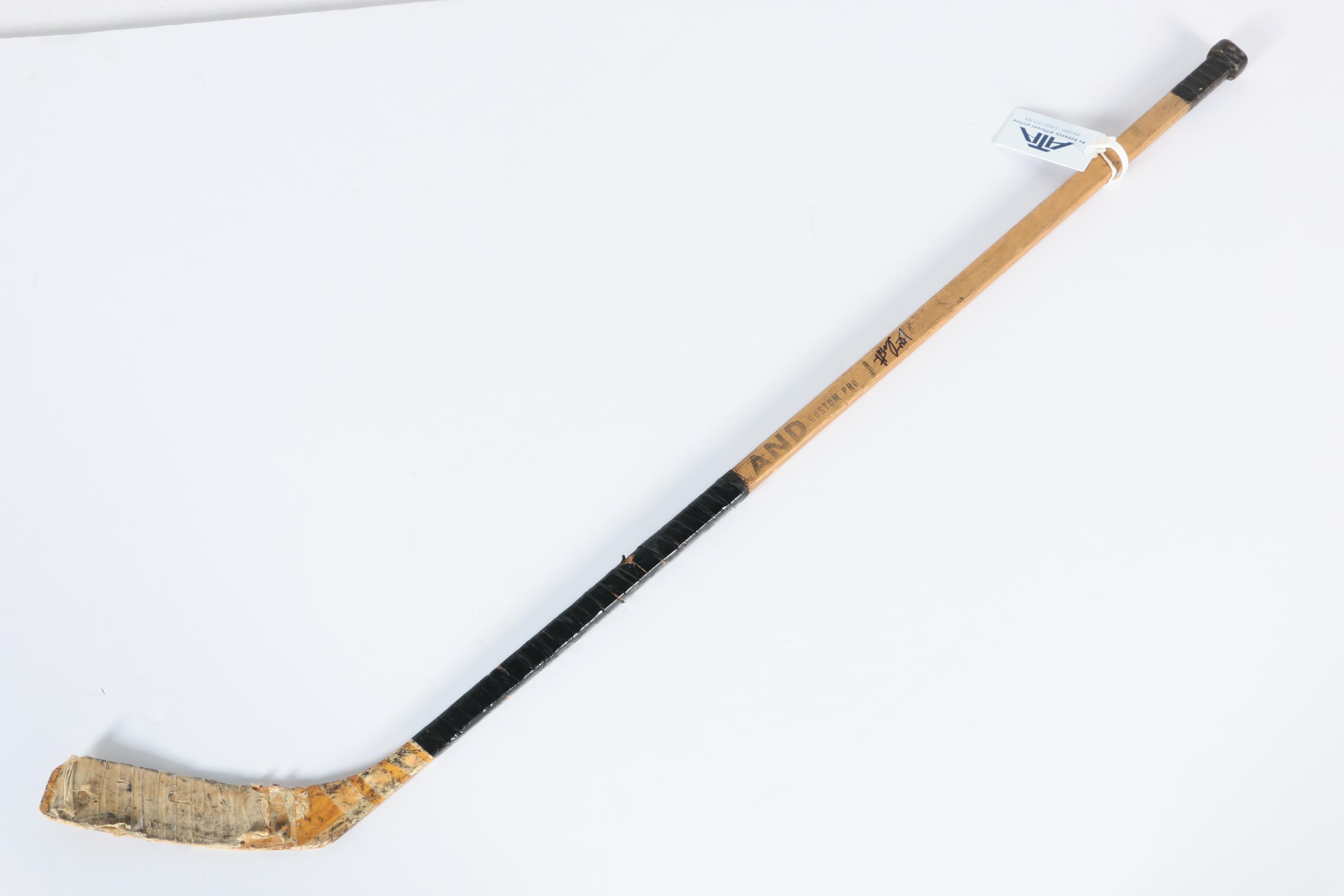 Stan Mikita and Lou Angotti Game Used Autographed Hockey Sticks - COAs