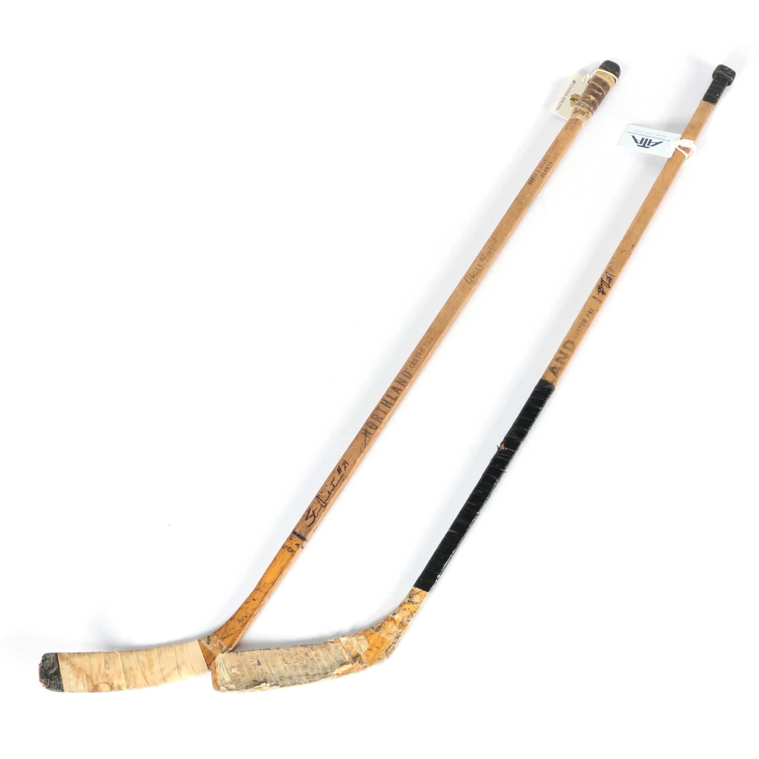 Stan Mikita and Lou Angotti Game Used Autographed Hockey Sticks - COAs