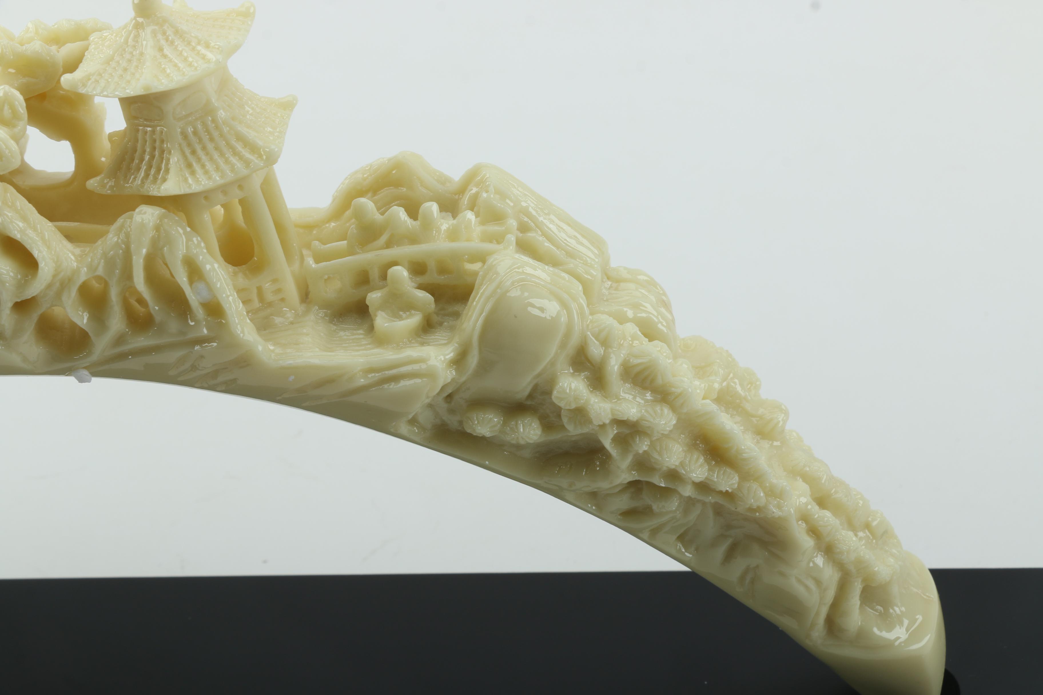 Carved Resin Elephant Tusk With Base