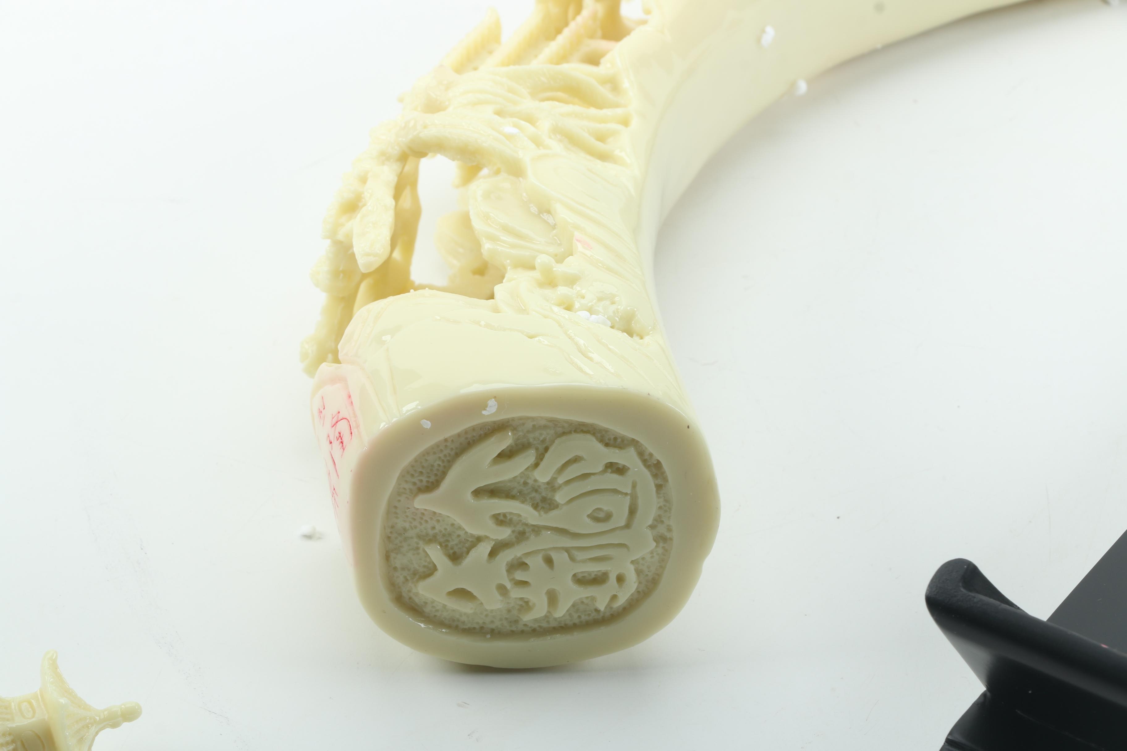 Carved Resin Elephant Tusk With Base