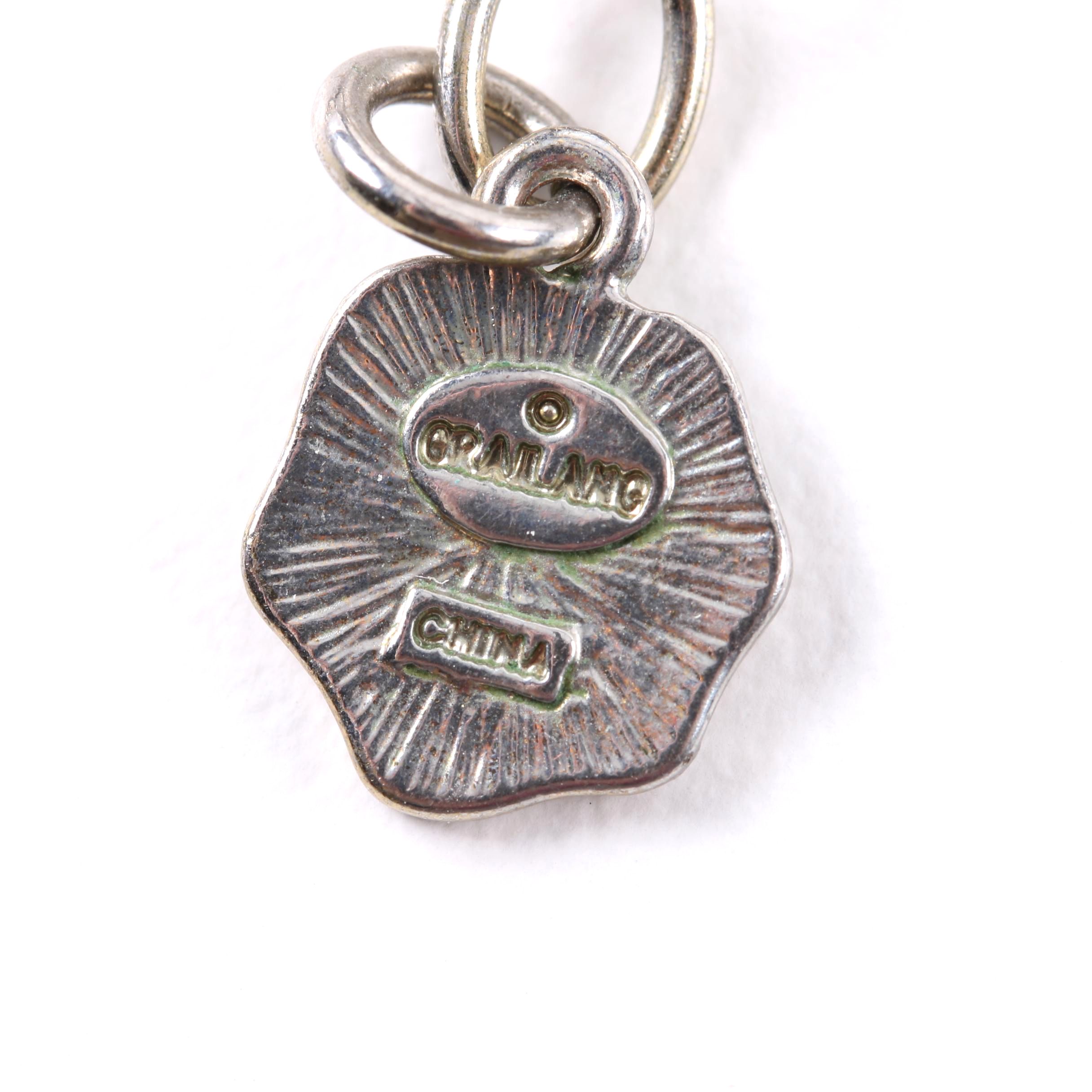 Gold Toned Jewelry Selection Including Troy Burch