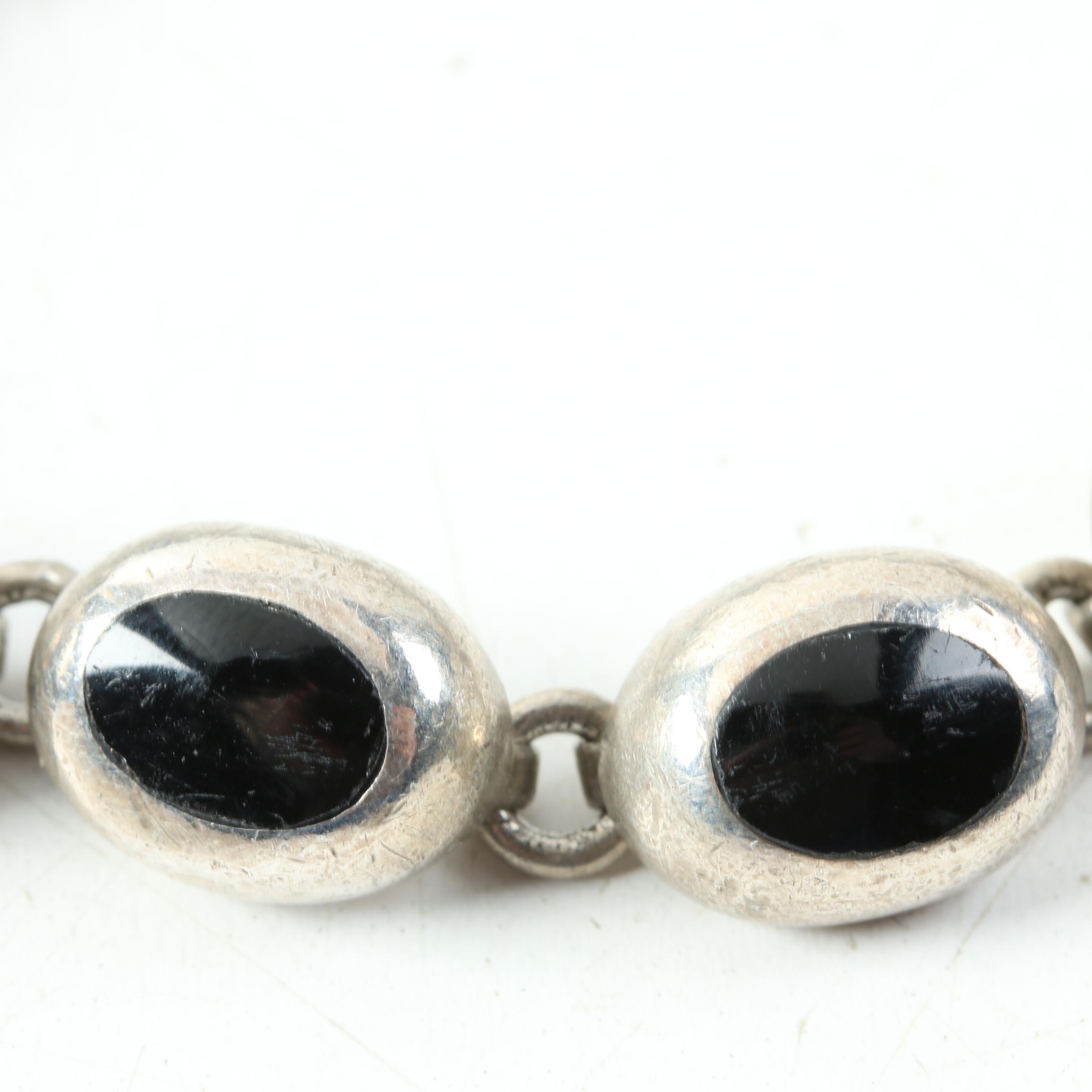 Assortment of Sterling Silver Jewelry Including Onyx, Mother of Pearl, and Opal