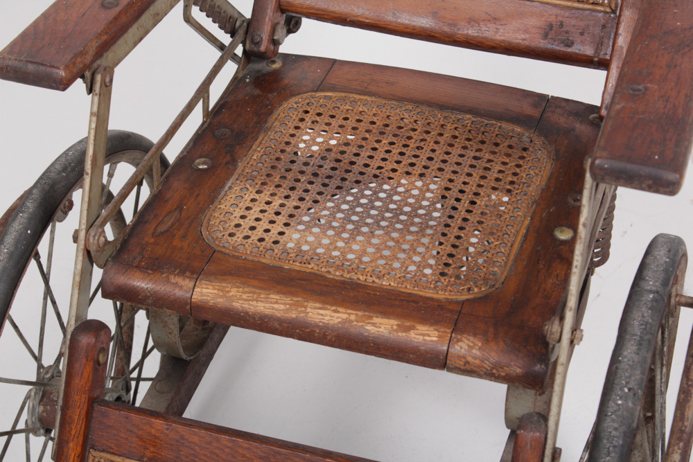 Antique Caned Wheelchair