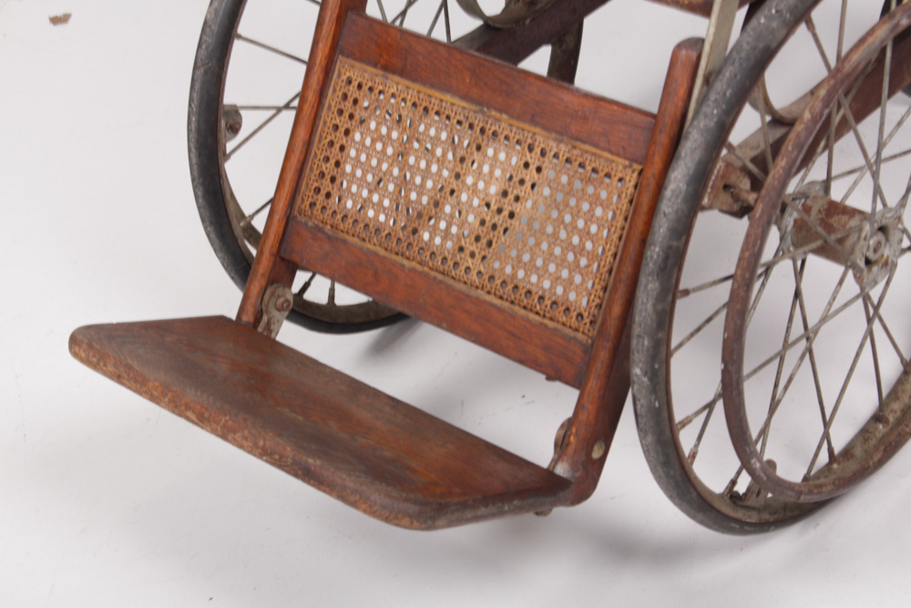 Antique Caned Wheelchair