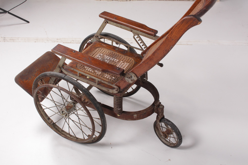 Antique Caned Wheelchair