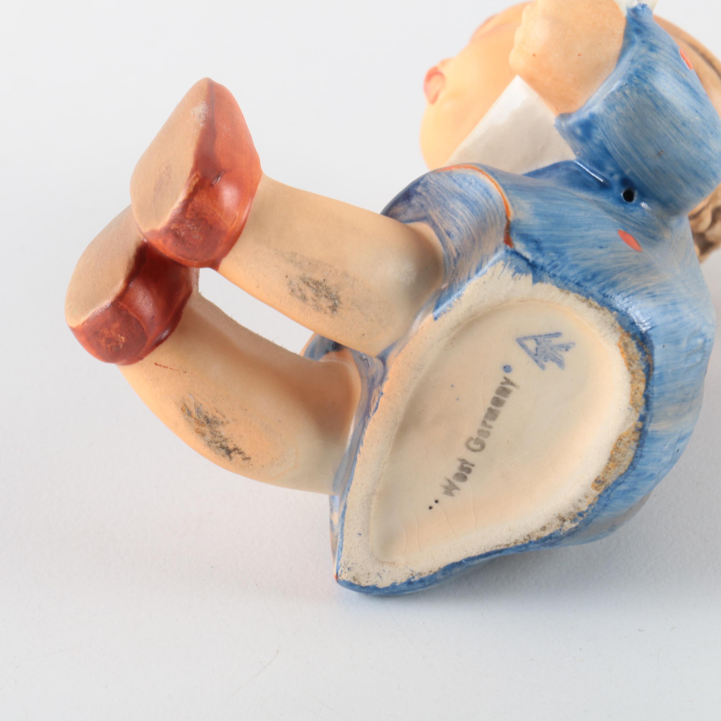 Hummel "Village Boy", "Sister", and "Banjo Player" Figurines