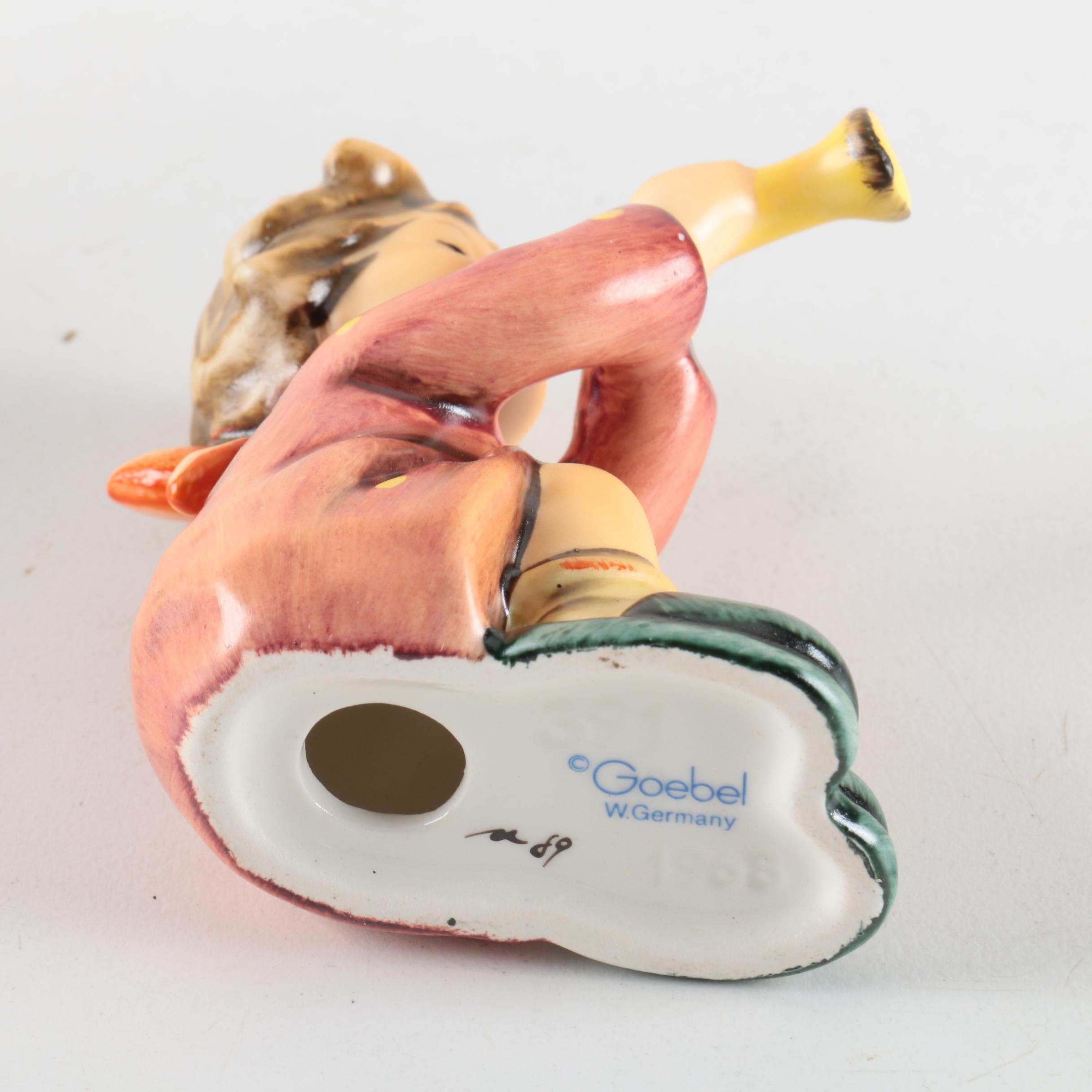 Goebel Hummel Figurines "Girl with Horn", Girl with Flowers", Girl with Basket"