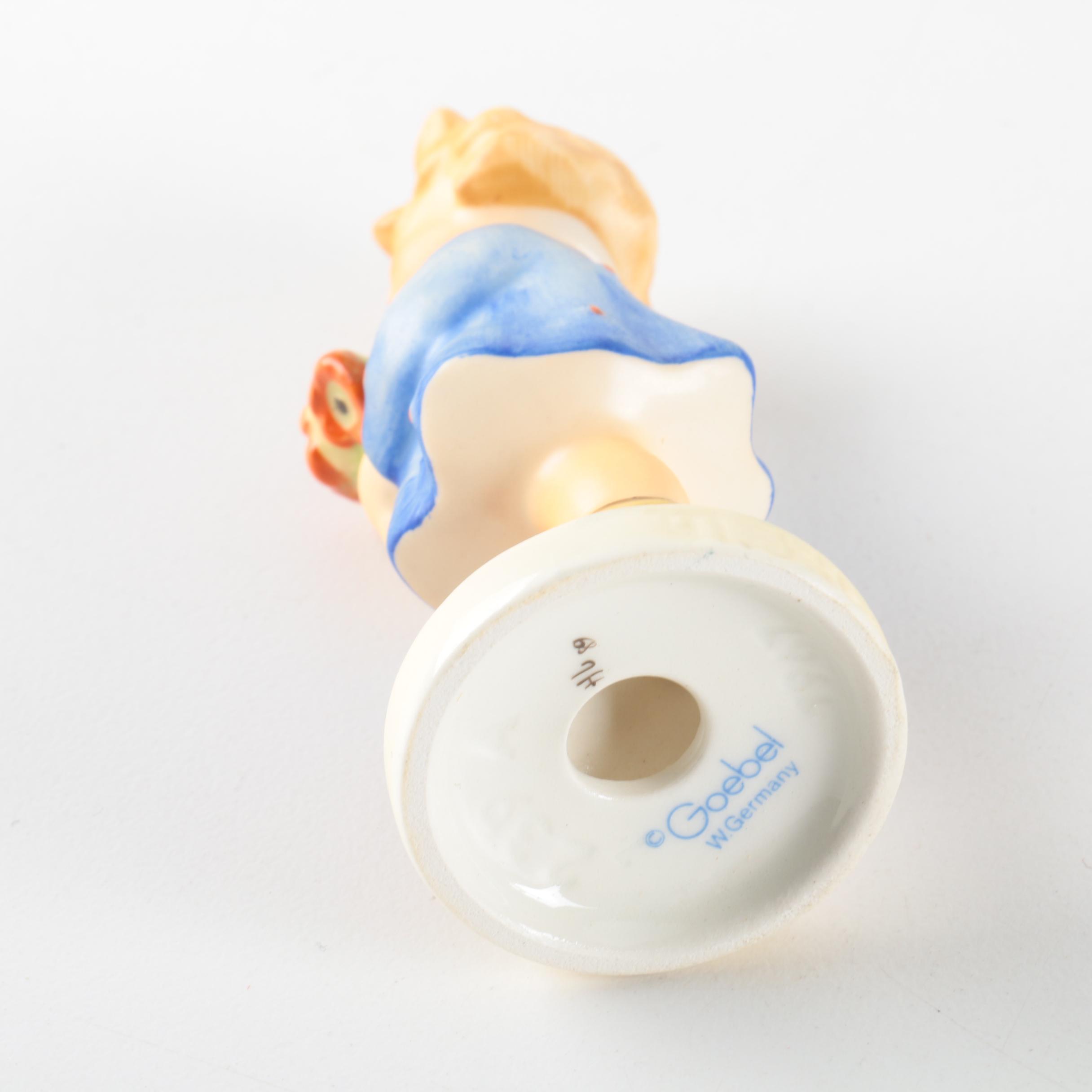 Goebel Hummel Figurines "Girl with Horn", Girl with Flowers", Girl with Basket"