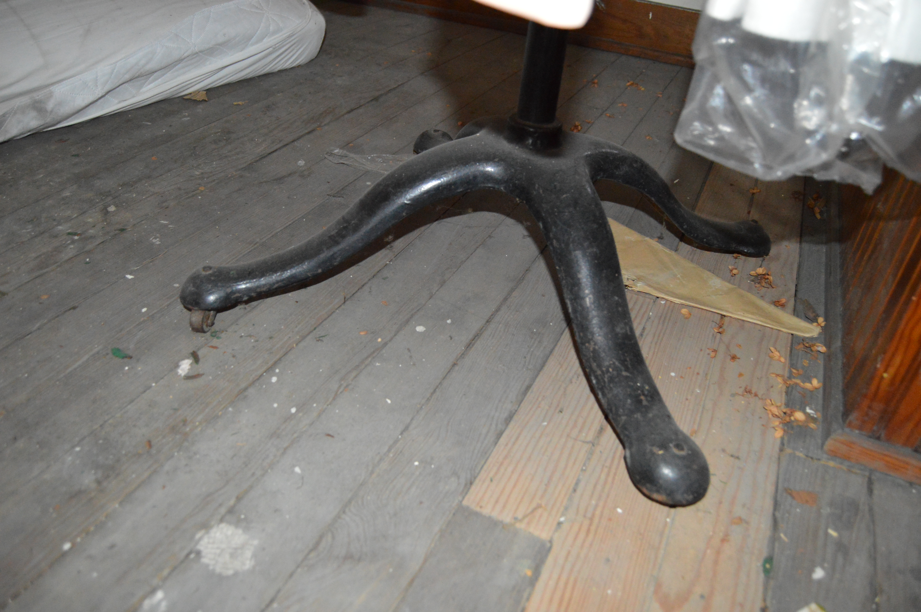 Vintage Iron Revolving Clothing Rack with Vintage Clothes Collection