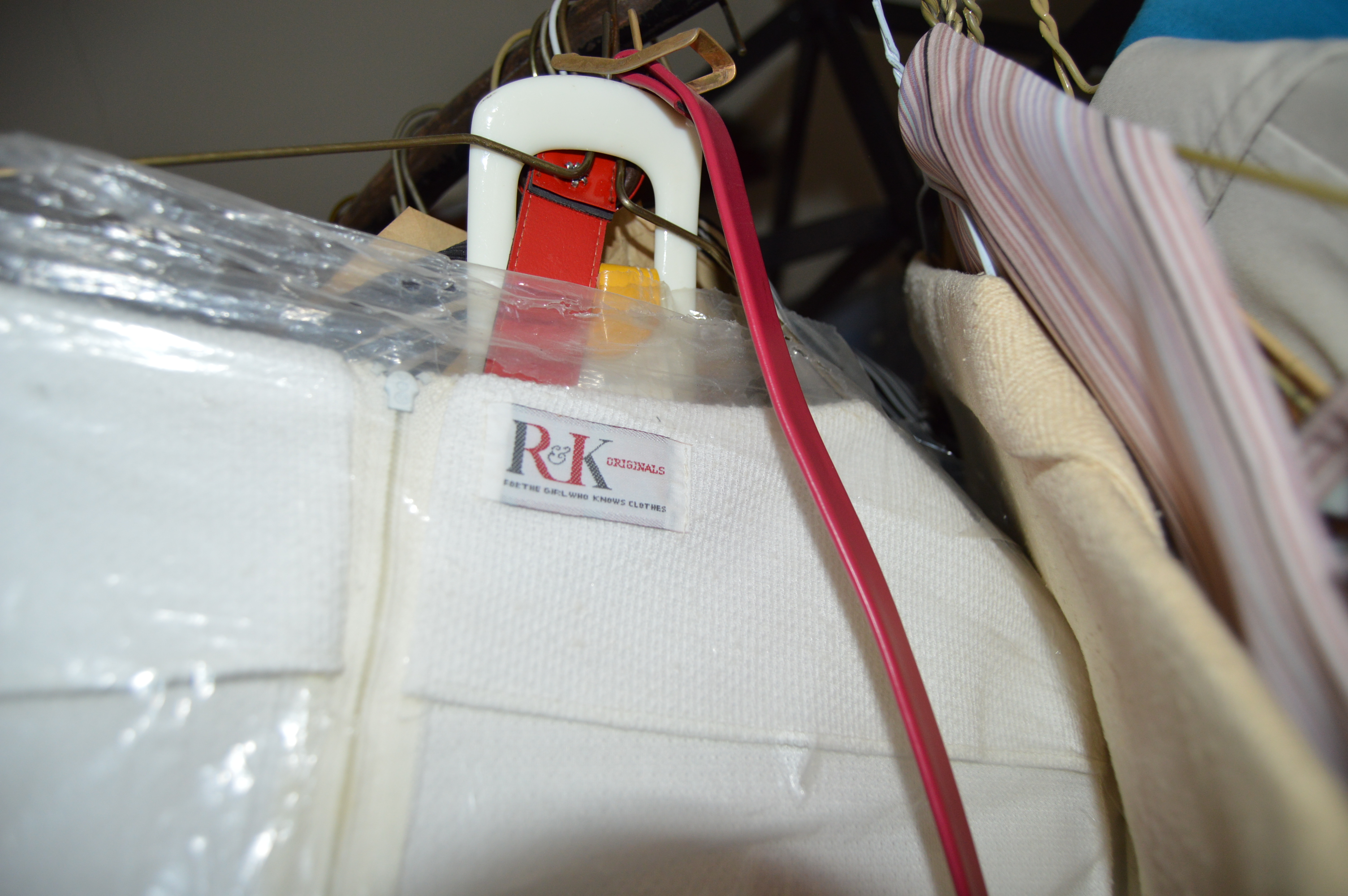 Vintage Iron Revolving Clothing Rack with Vintage Clothes Collection