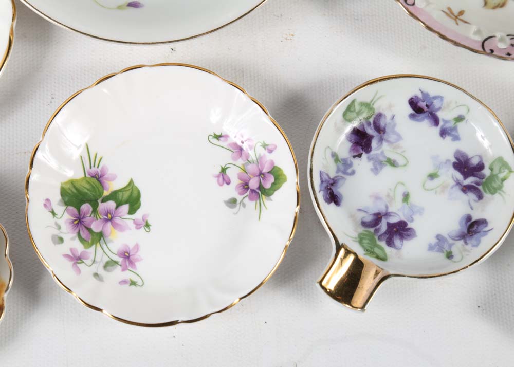 Assortment of Tea Cups, Saucers, and Spoon Rest