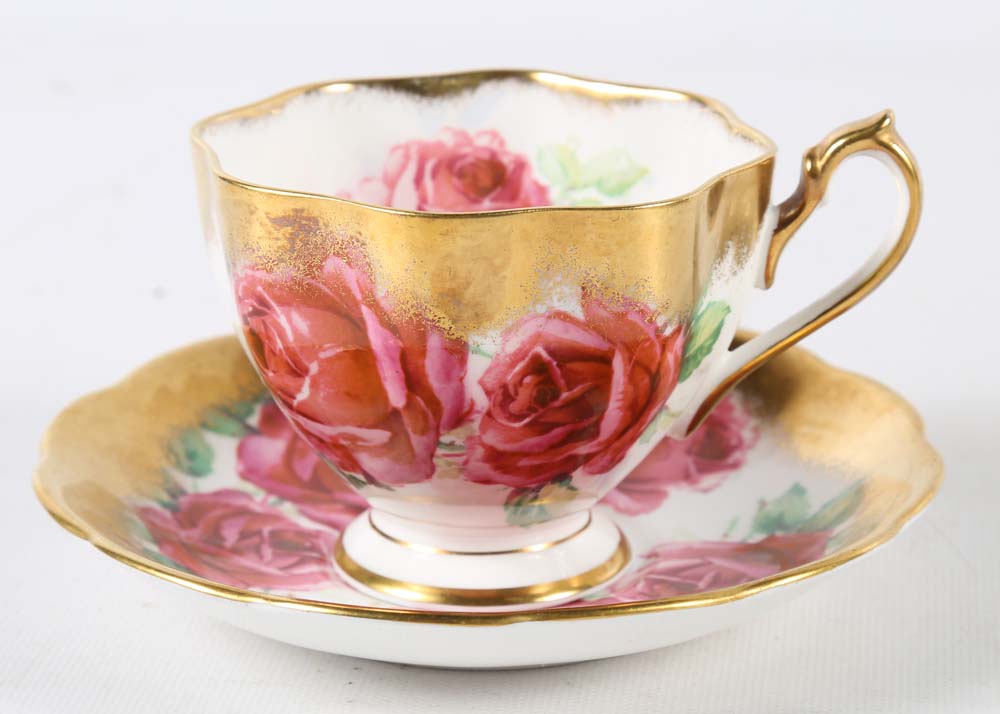 Assortment of Tea Cups, Saucers, and Spoon Rest