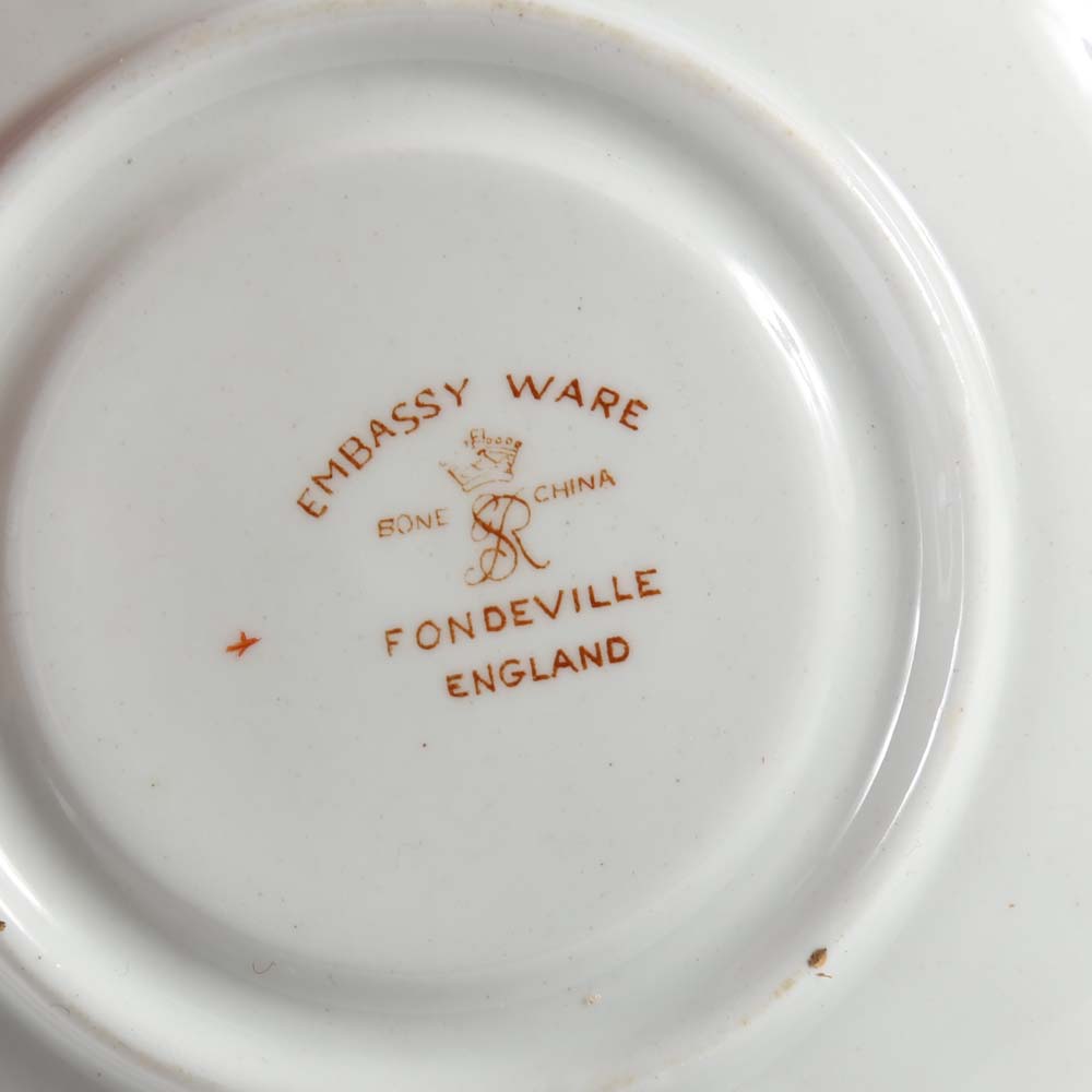 Assortment of Tea Cups, Saucers, and Spoon Rest